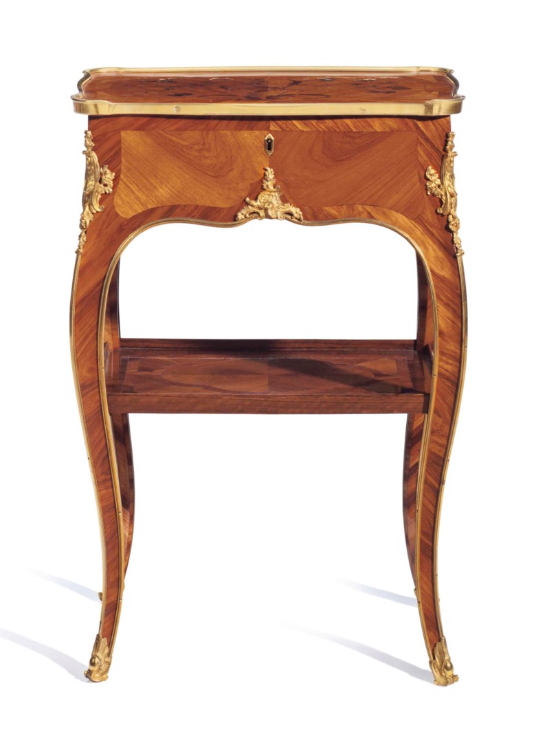 A Louis XV ormolu-mounted bois satine, tulipwood and amaranth bois de bout marquetry table en chiffonnière, by Bernard II van Risenburgh, circa 1750. 26½  in (67.3  cm) high, 17¼  in (43.8  cm) wide, 11¾  in (29.8  cm) deep. Sold for $93,750 on 14-15 June 2016 at Christie’s in New York