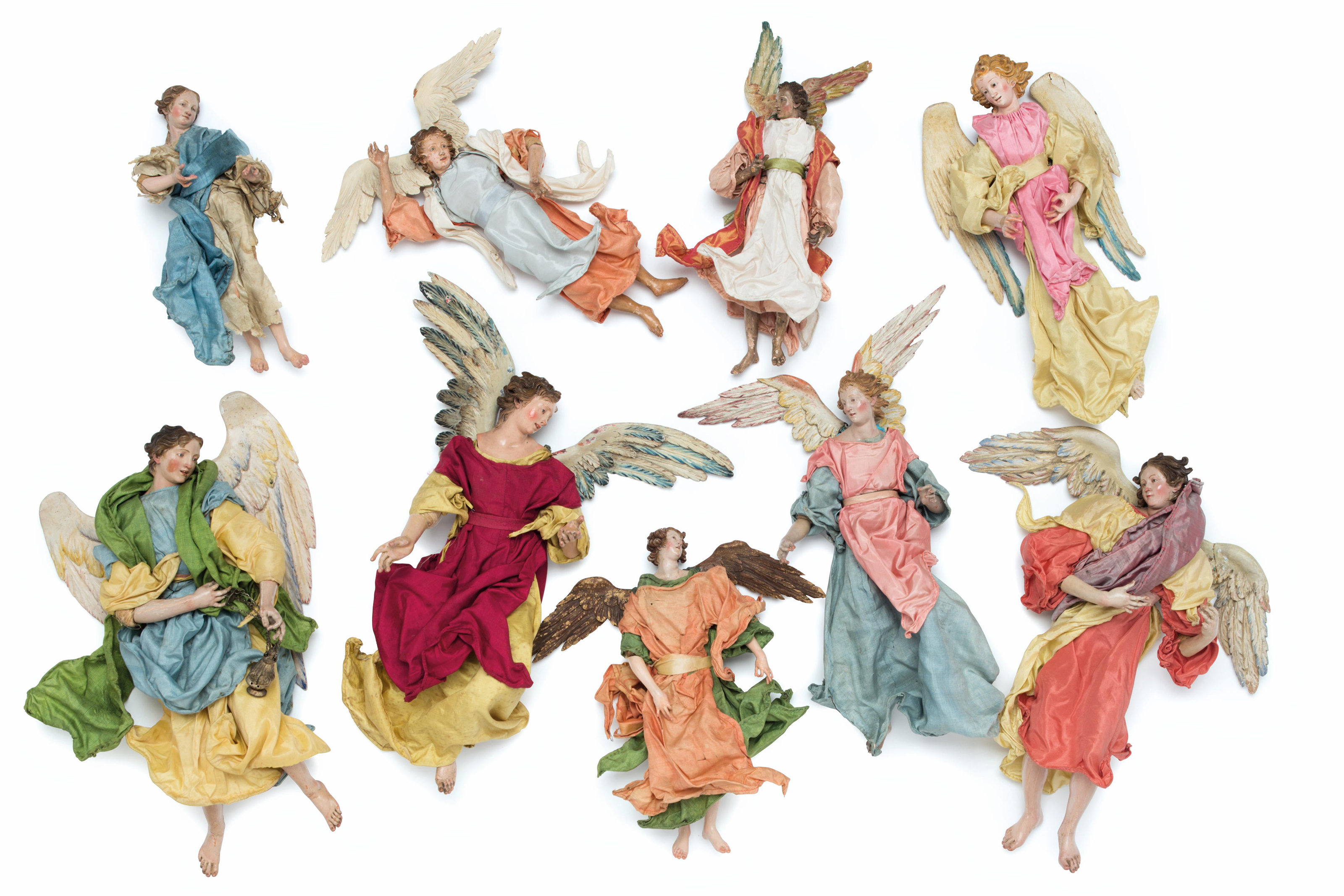 A Group Of Eleven Neapolitan Creche Figures Of Angels Late
