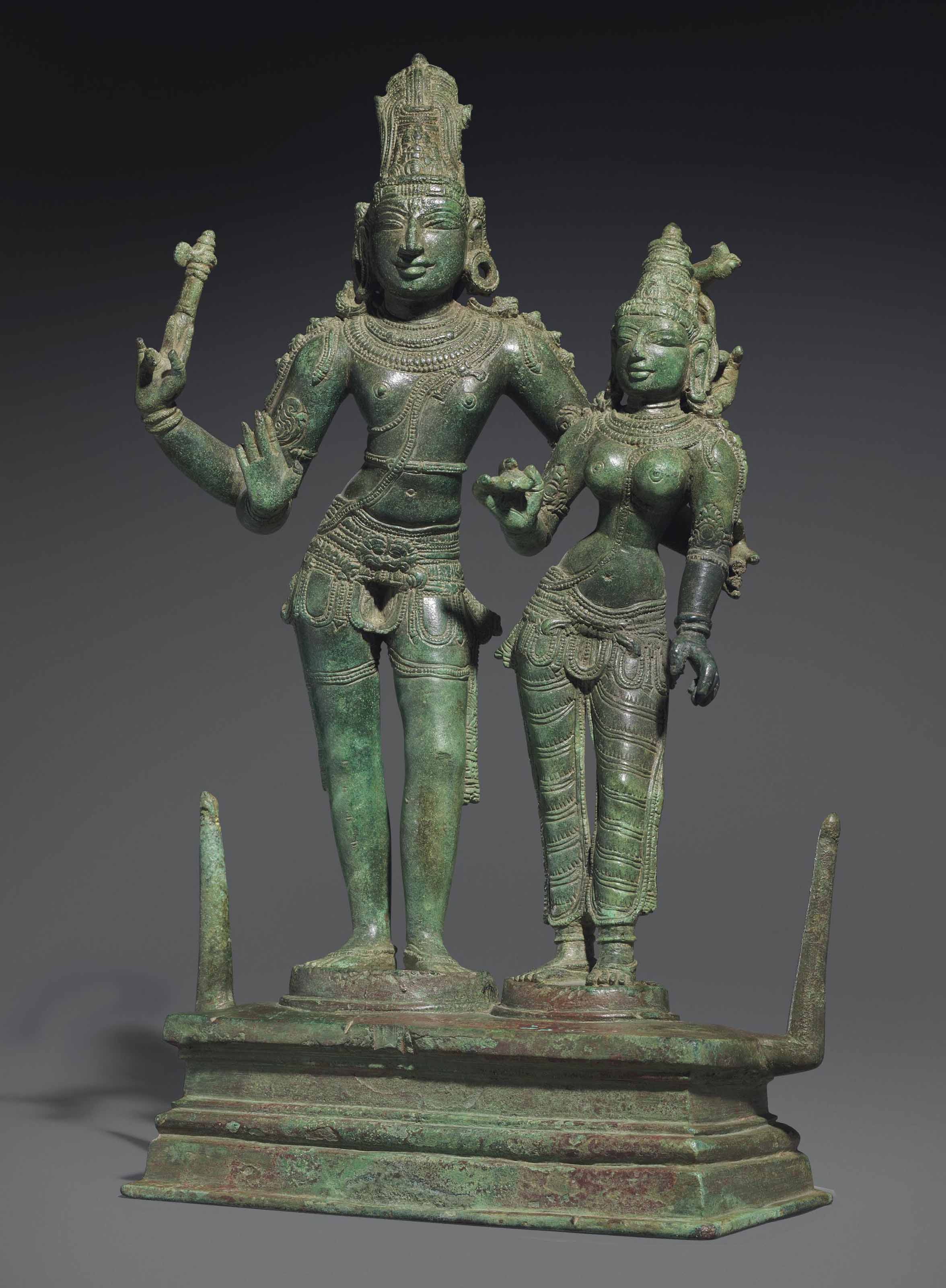 A BRONZE FIGURE OF SHIVA AND PARVATI auctions & price archive
