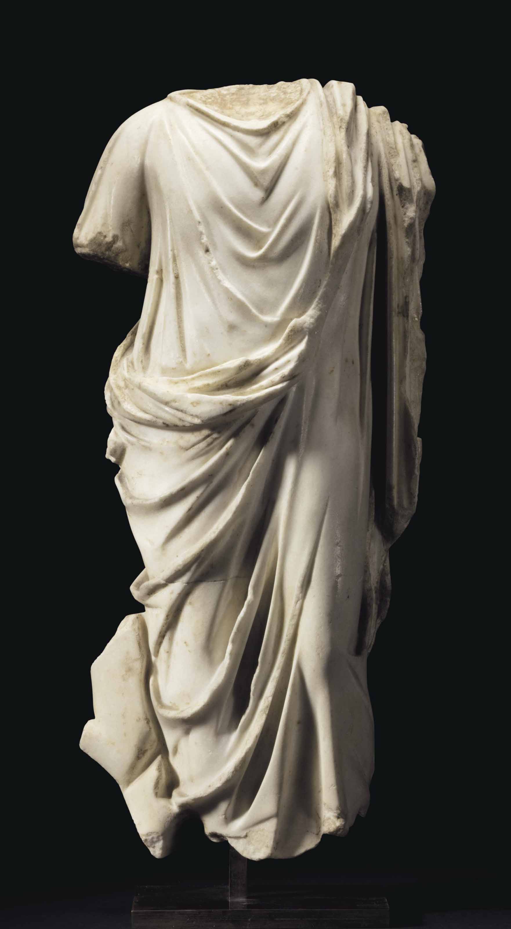 A ROMAN MARBLE DRAPED MALE TORSO