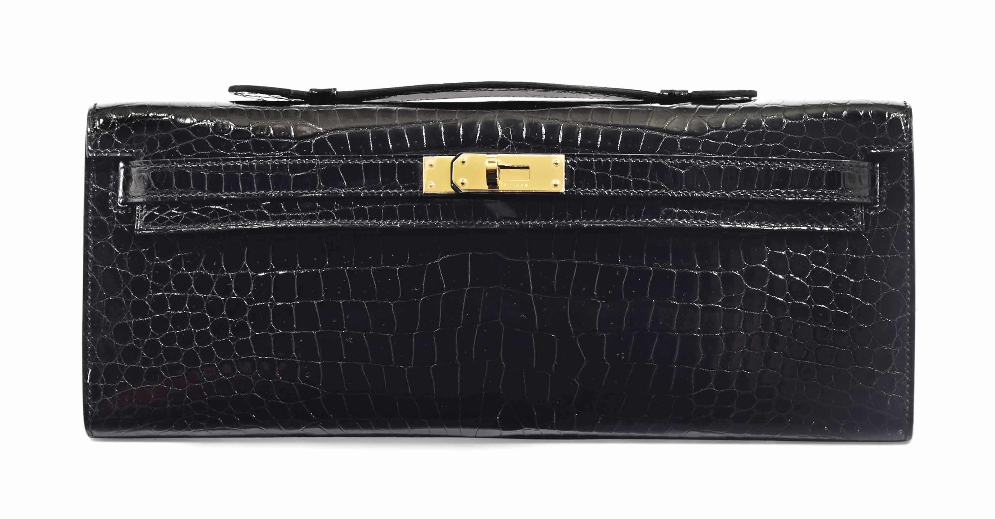 POCHETTE KELLY CUT EN CROCODILE POROSUS LISSE NOIR GARNITUR. auctions price archive