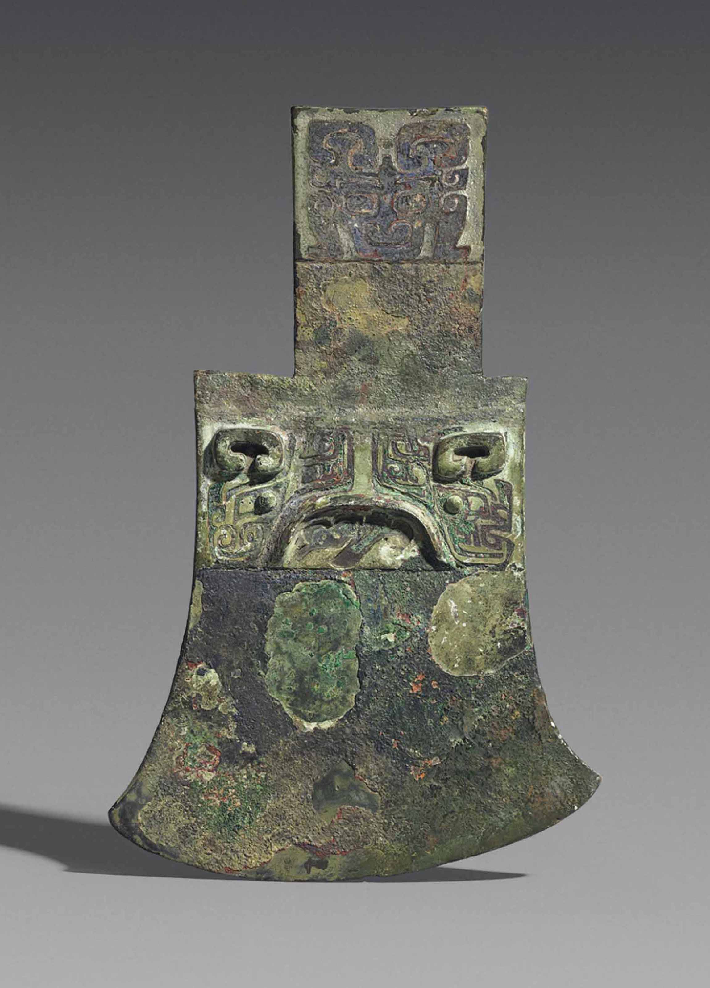 A BRONZE AXE HEAD , SHANG DYNASTY (16001100 BC) Christie's