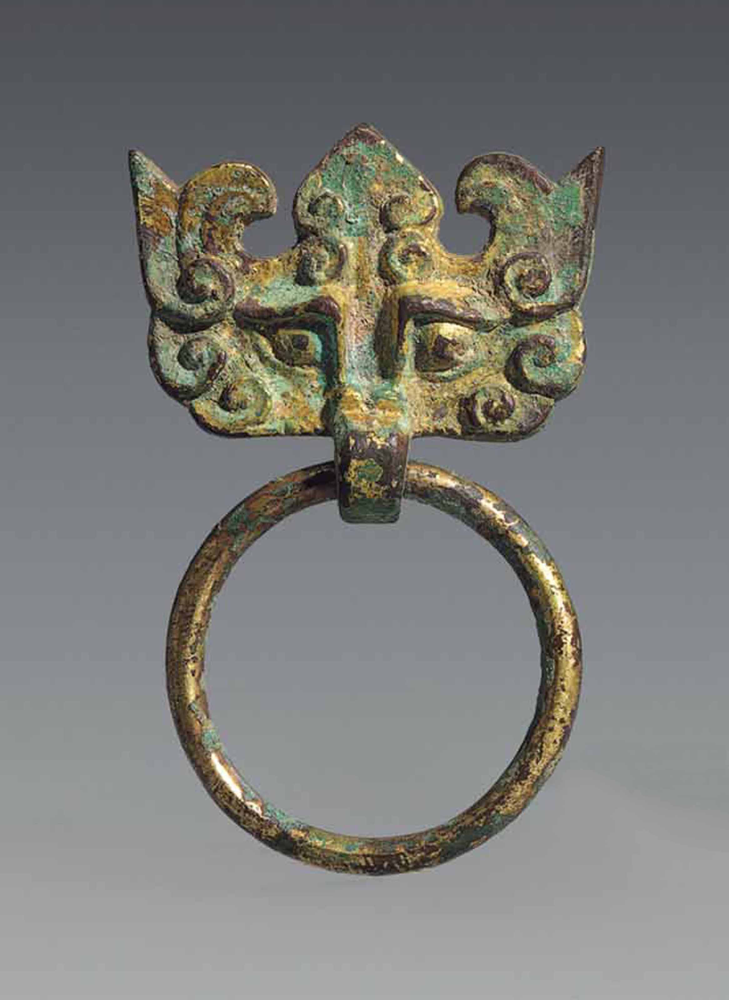 A FINE AND RARE PARCEL GILT-COPPER LOBED POURING BOWL, YI , TANG