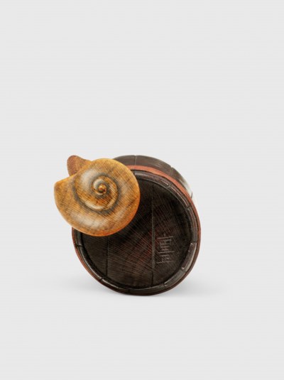 A WOOD NETSUKE OF A SNAIL ON A BUCKET , SIGNED SHIGEMASA , EDO PERIOD (19TH CENTURY) | Christie's