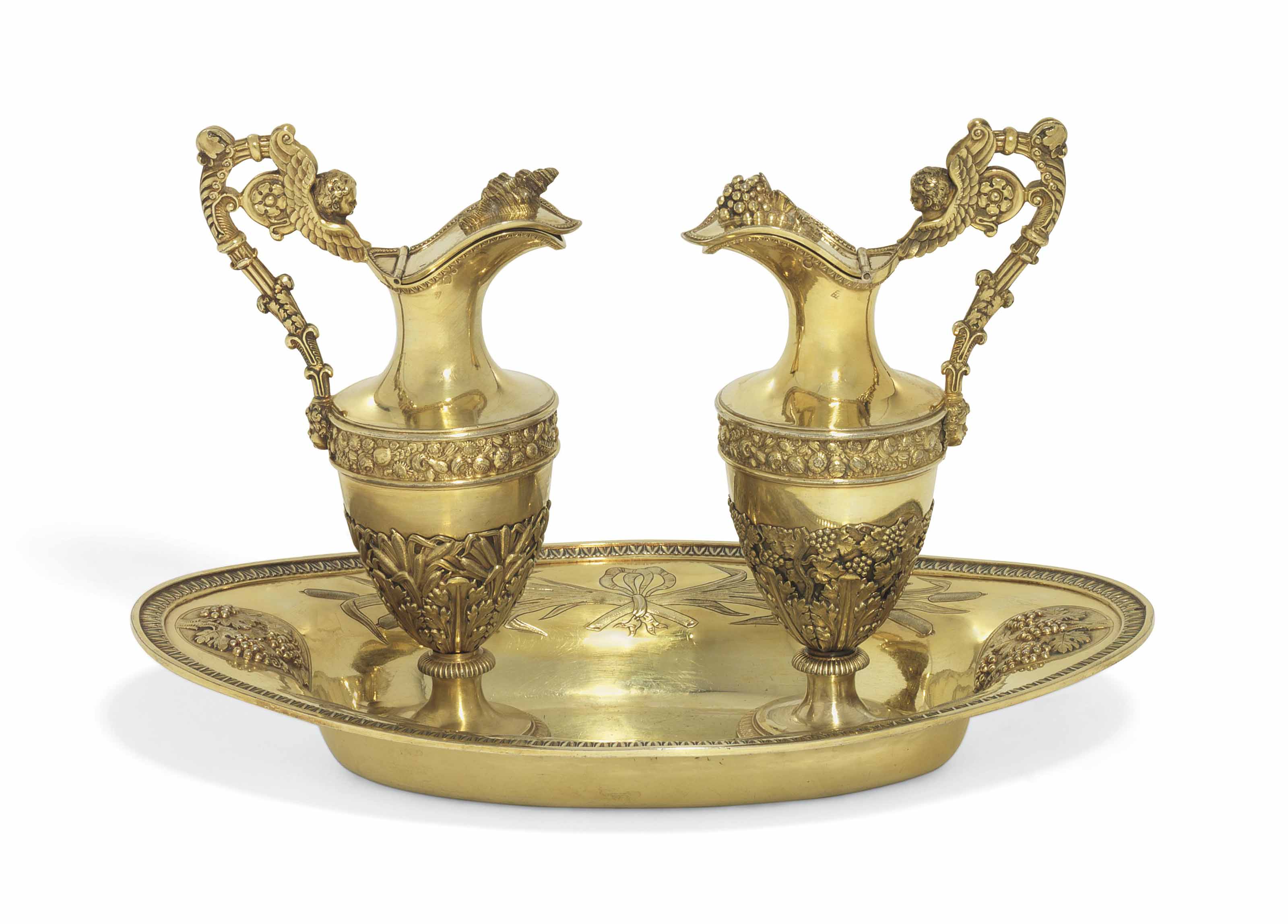 A PAIR OF FRENCH SILVERGILT ALTARCRUETS AND AN ASSOCIATED STAND , THE