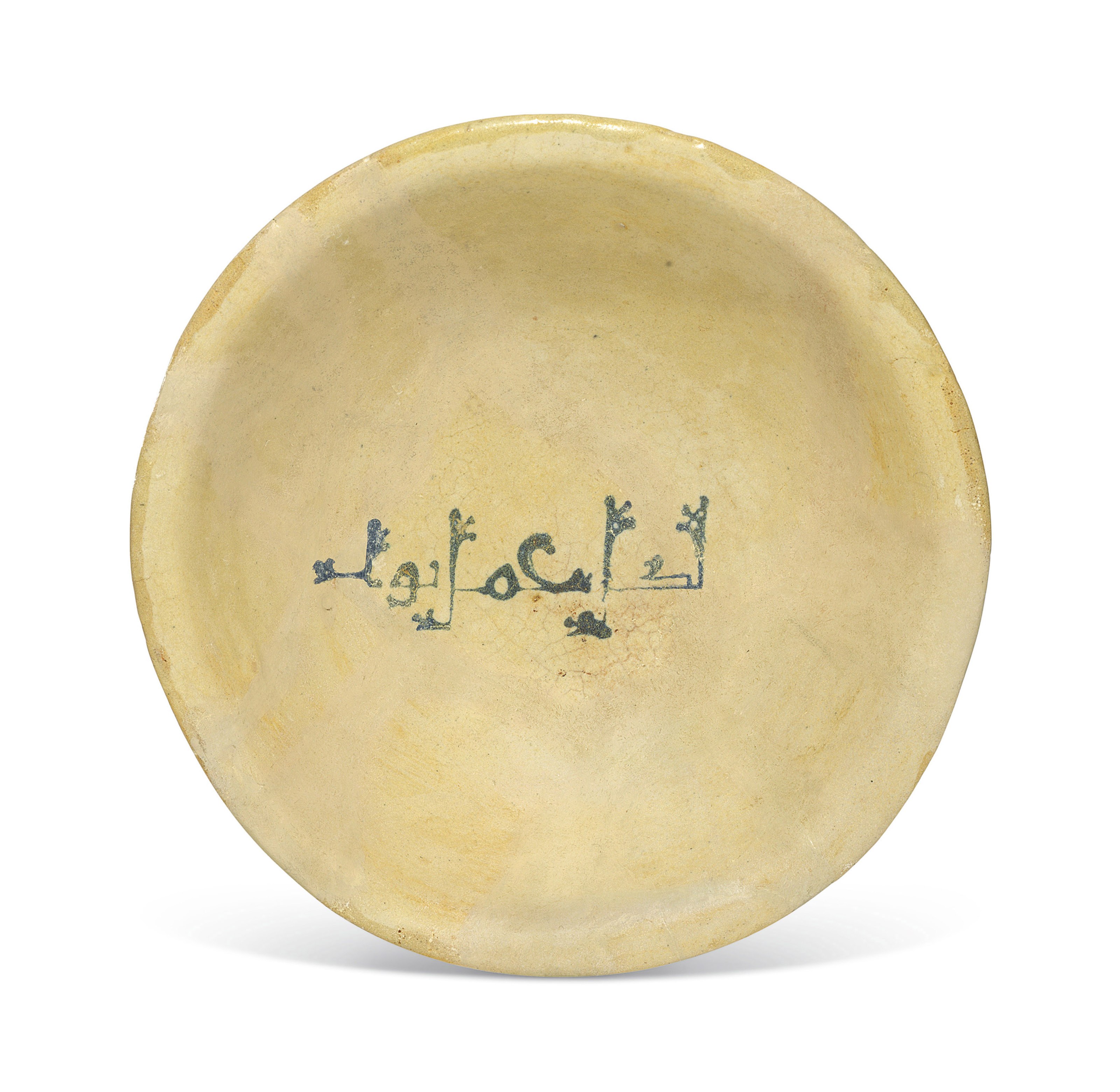 AN ABBASID TINGLAZED POTTERY BOWL , MESOPOTAMIA, 9TH CENTURY Christie's