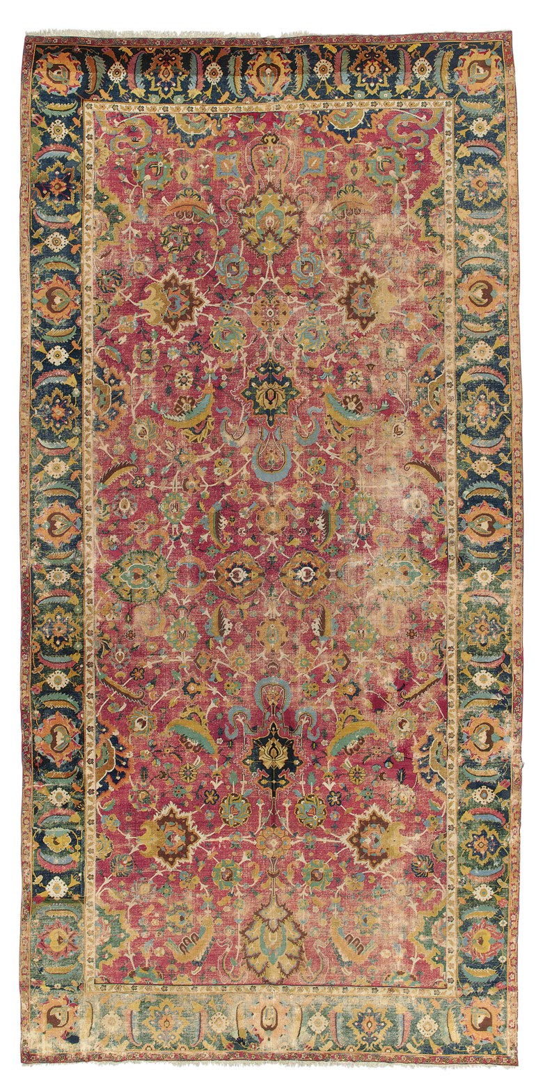Bir İsfahan galeri halısı, orta Pers bölgesi, 17. yüzyılın ilk yarısı.  17 ft3 inç x 8 ft 4 inç (525 cm x 253 cm).  Londra'daki Christie's'de 26 Ekim 2017'de 35.000 £ 'a satıldı