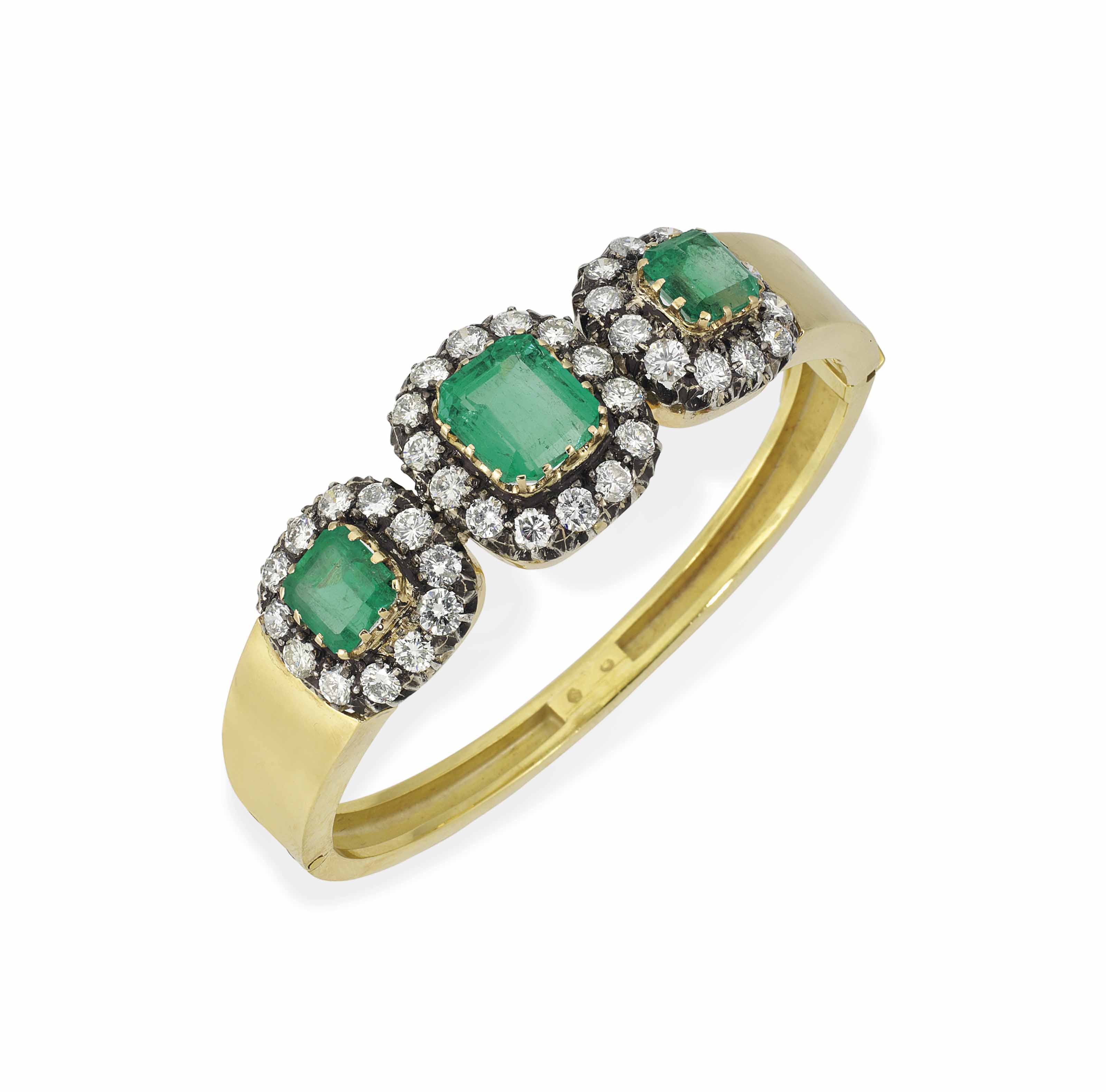 AN EMERALD AND DIAMOND HINGED BANGLE | Christie's