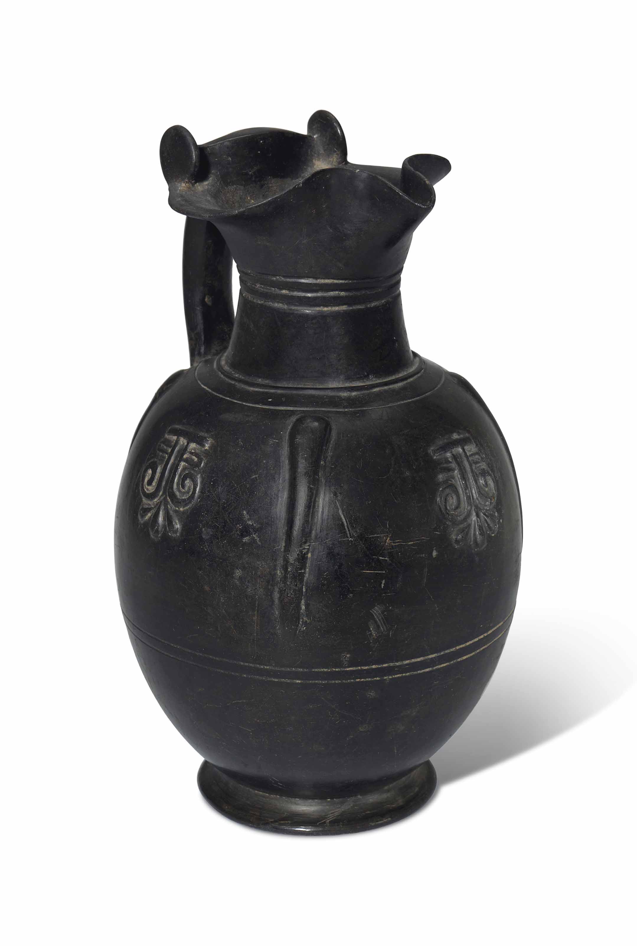 An Etruscan Bucchero Pesante Trefoil Oinochoe Circa 6th Century