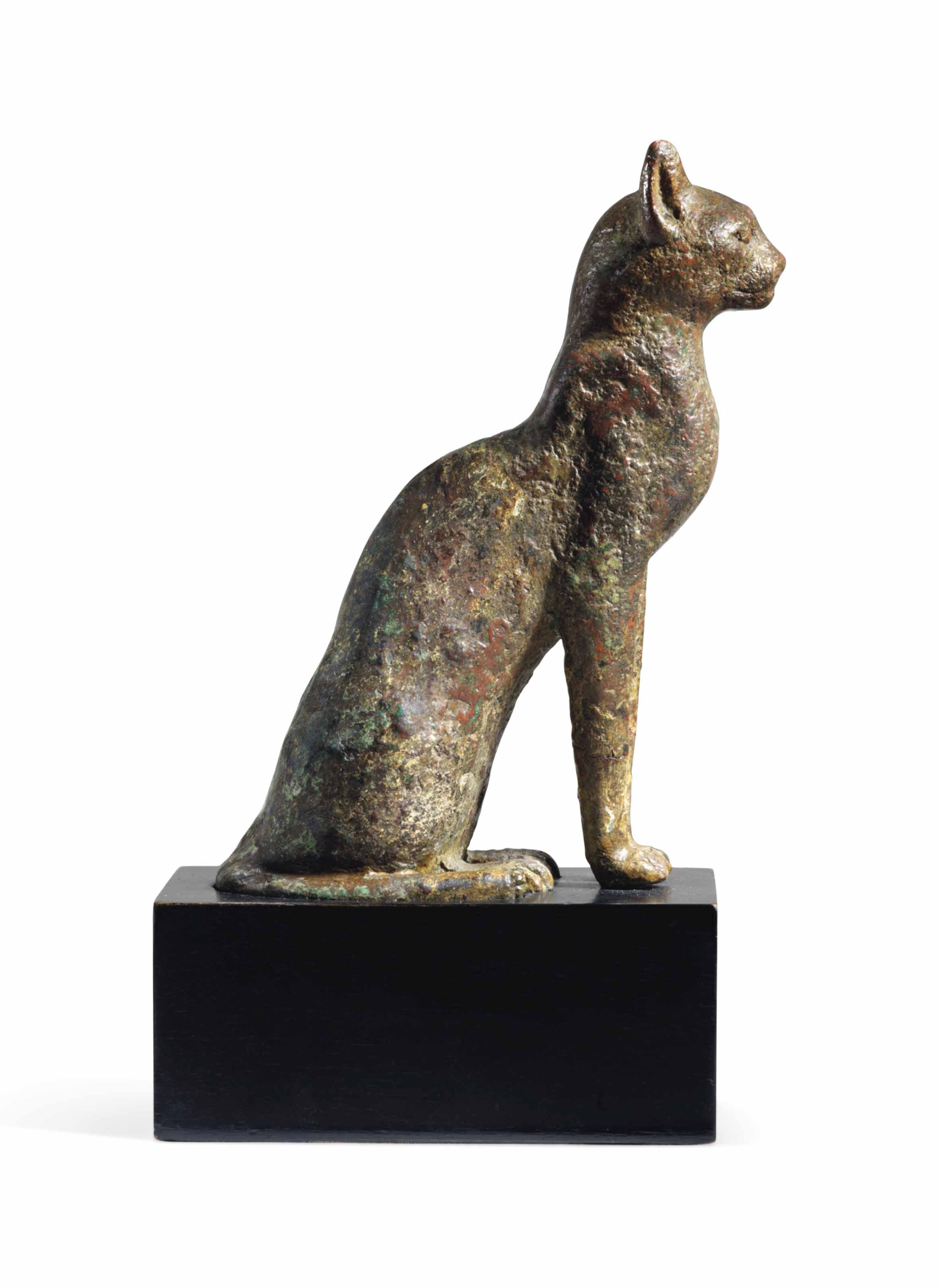 AN EGYPTIAN BRONZE CAT