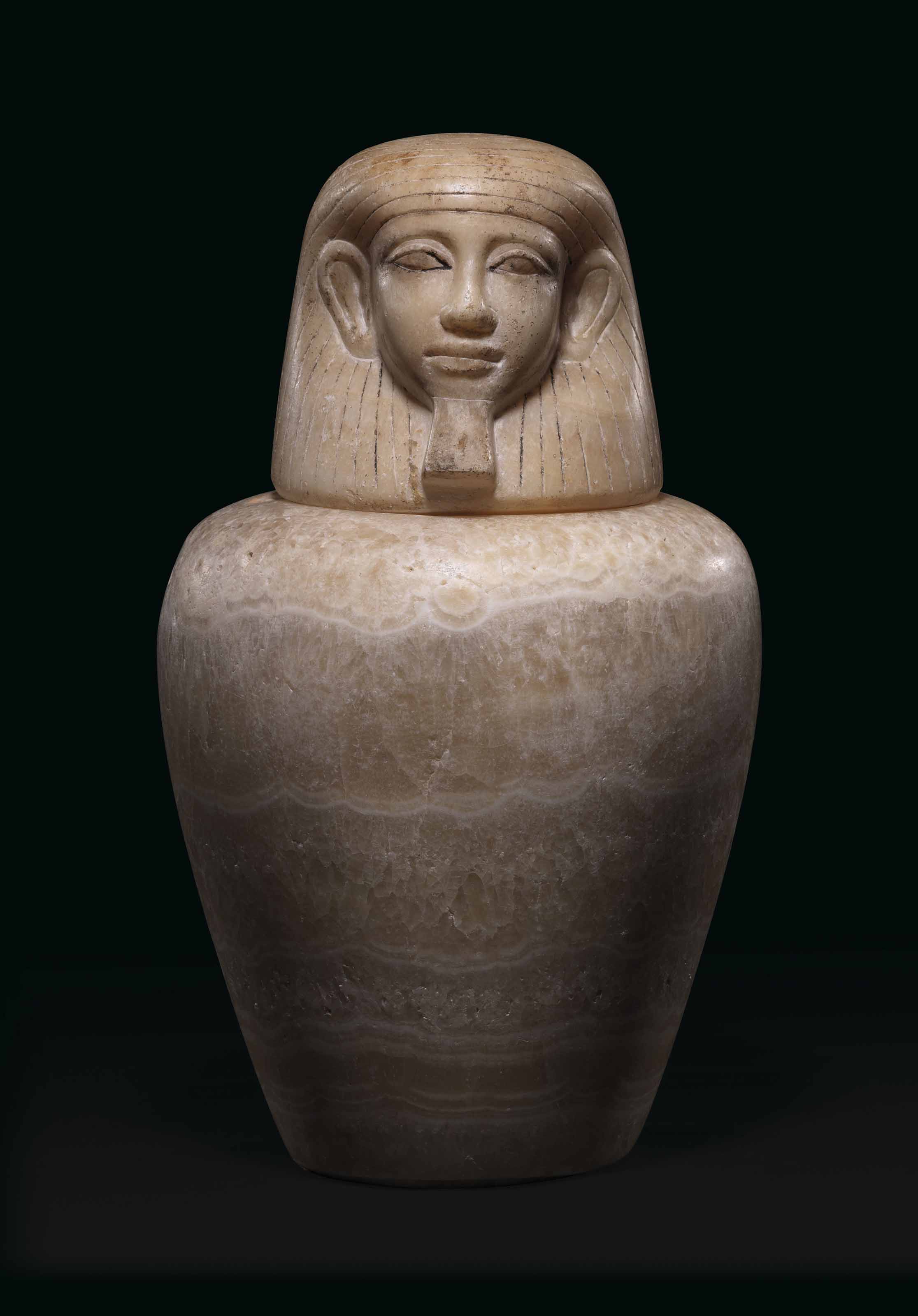 AN EGYPTIAN ALABASTER CANOPIC JAR , MIDDLE KINGDOM, 11TH12TH DYNASTY