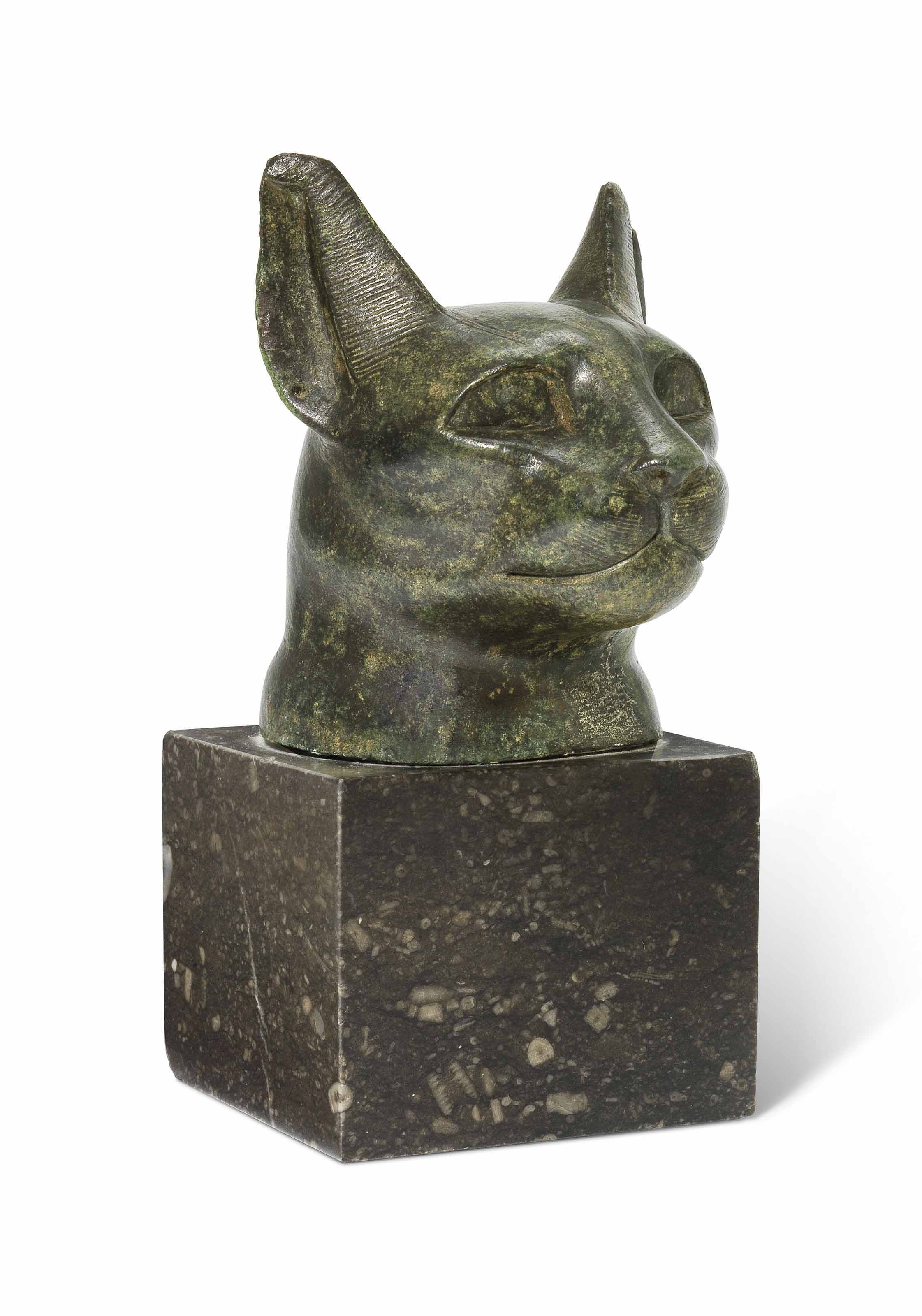 AN EGYPTIAN BRONZE CAT HEAD , LATE PERIOD, CIRCA 664332 B.C. Christie's