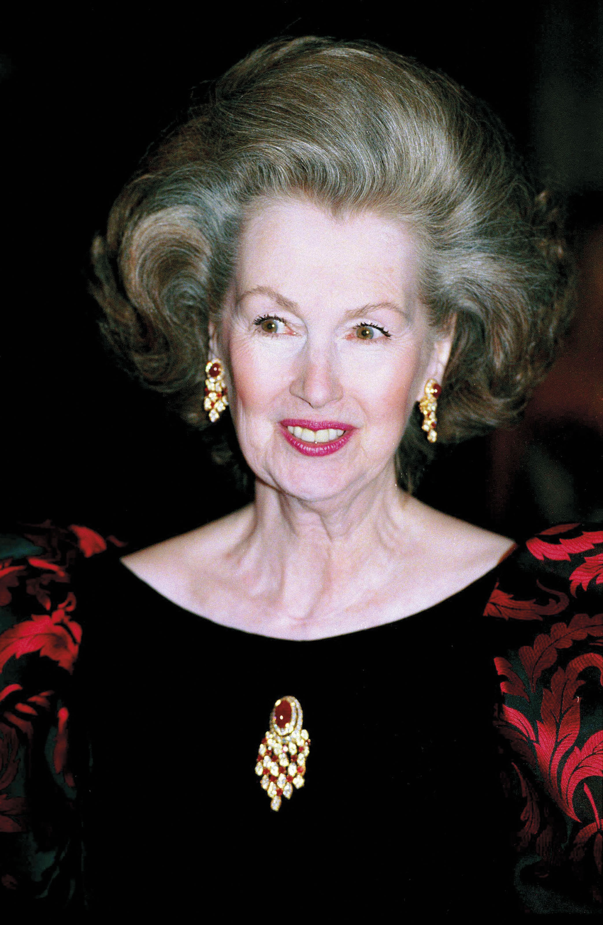 Raine, Countess Spencer, wearing the gold, ruby and diamond parure by Van Cleef & Arpels
