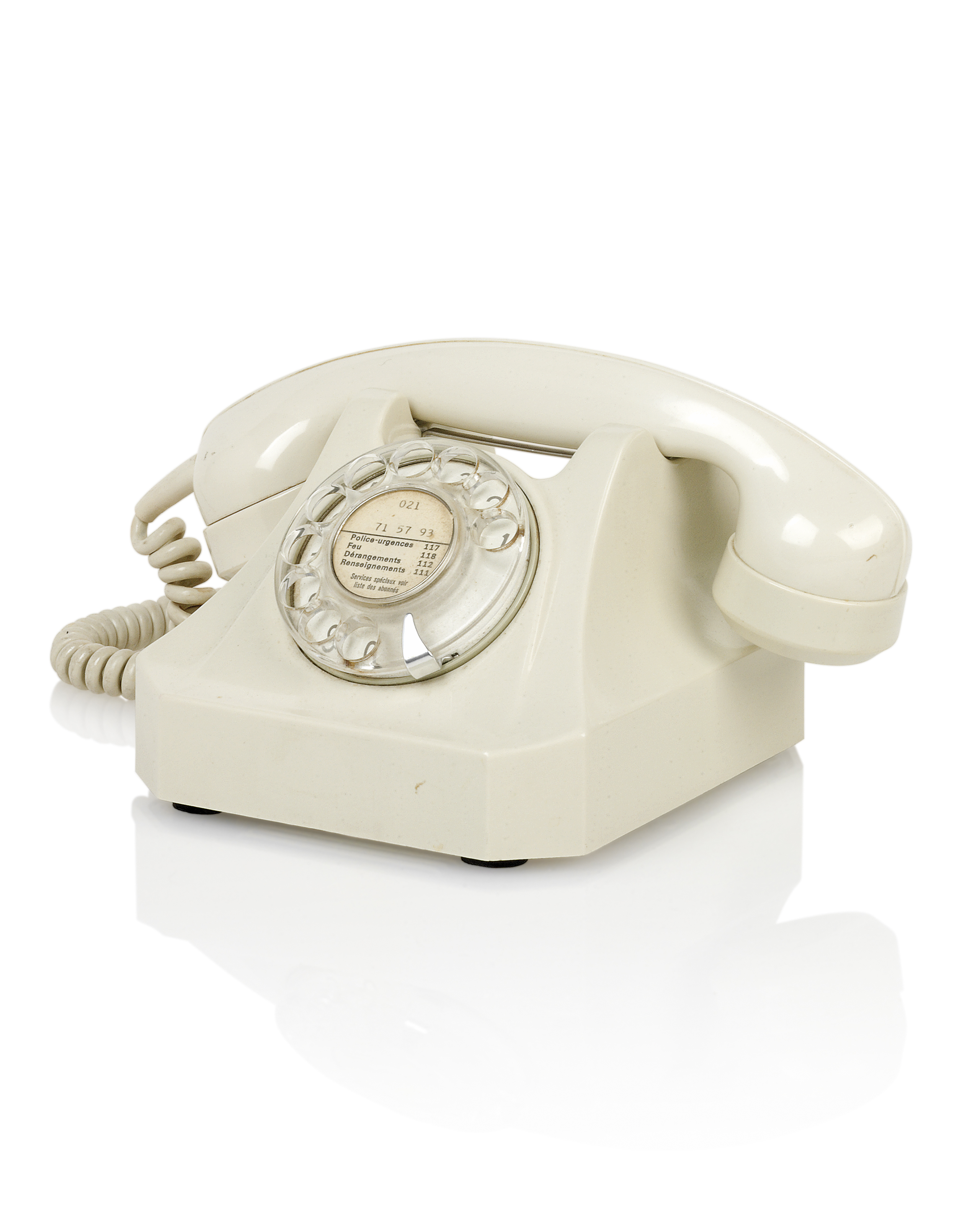 A SWISS ‘TFG 339.205’ WHITEPLASTIC ROTARY DIAL TELEPHONE , BY