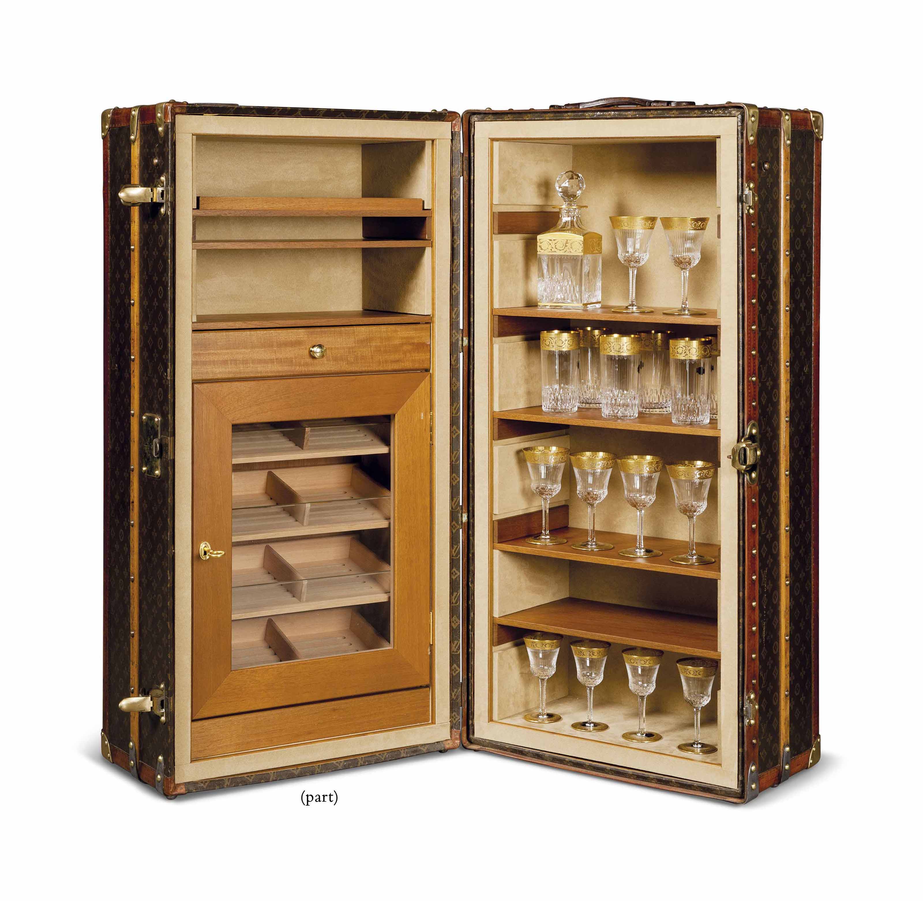 A Louis Vuitton Wardrobe Trunk Modified As A Cocktail Bar And Humidor 1920 30s Converted 2017 Mid 20th Century Trunk Christie S