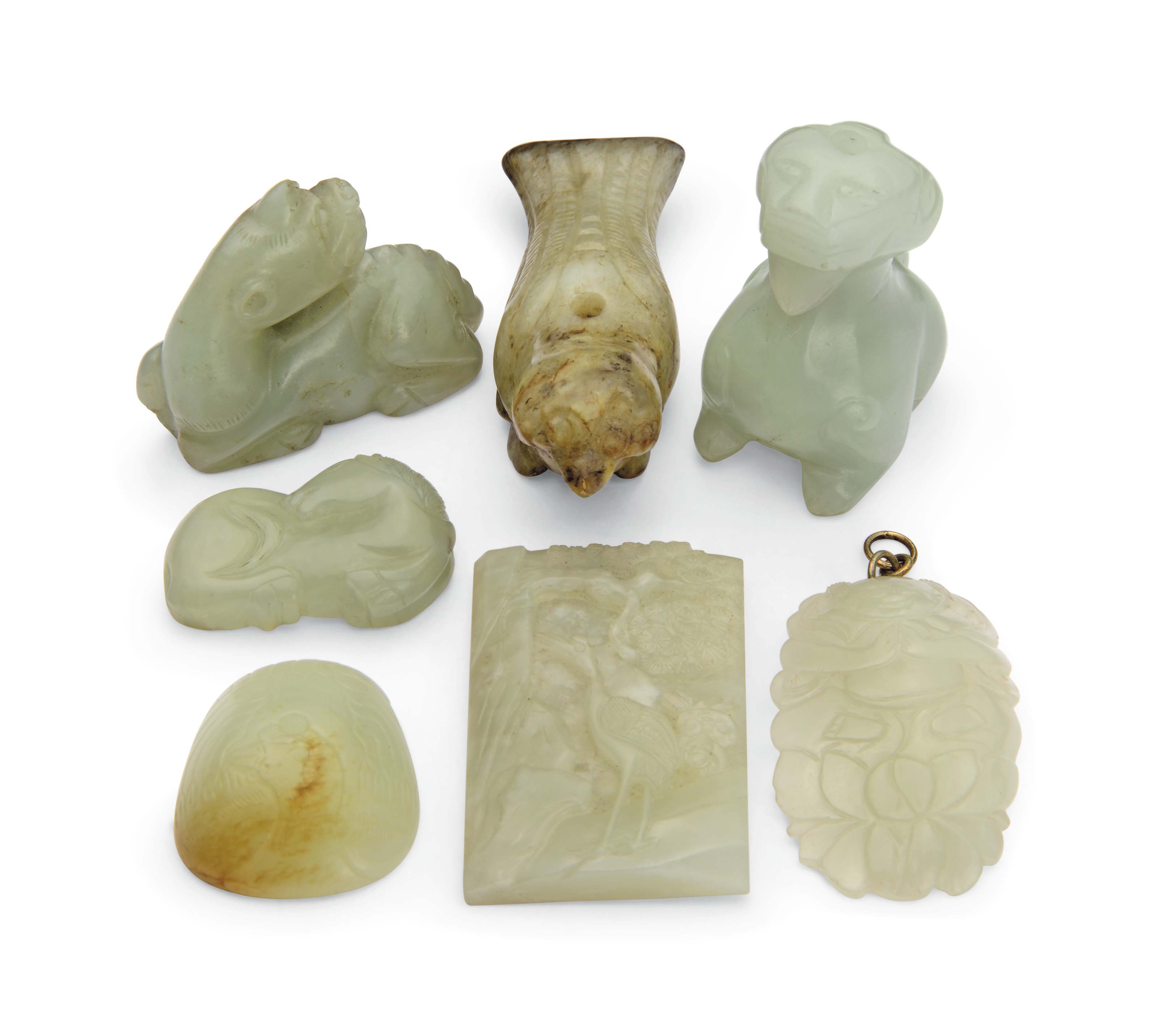 A GROUP OF SEVEN CELADON JADE CARVINGS , MING DYNASTY (13681644)19TH