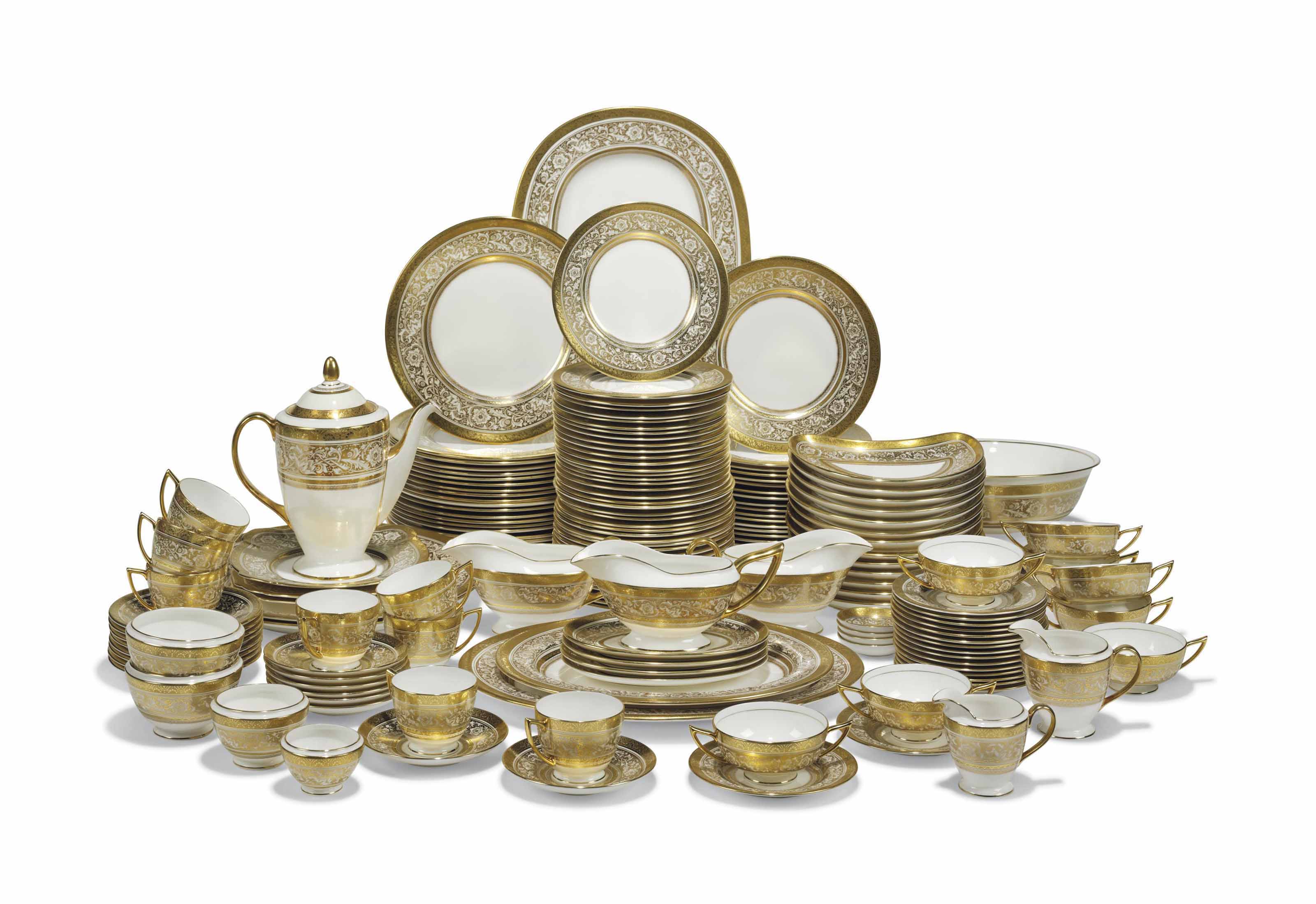 A MINTON GILT 'PORCELAIN BALL' PATTERN PART DINNERSERVICE , 20TH