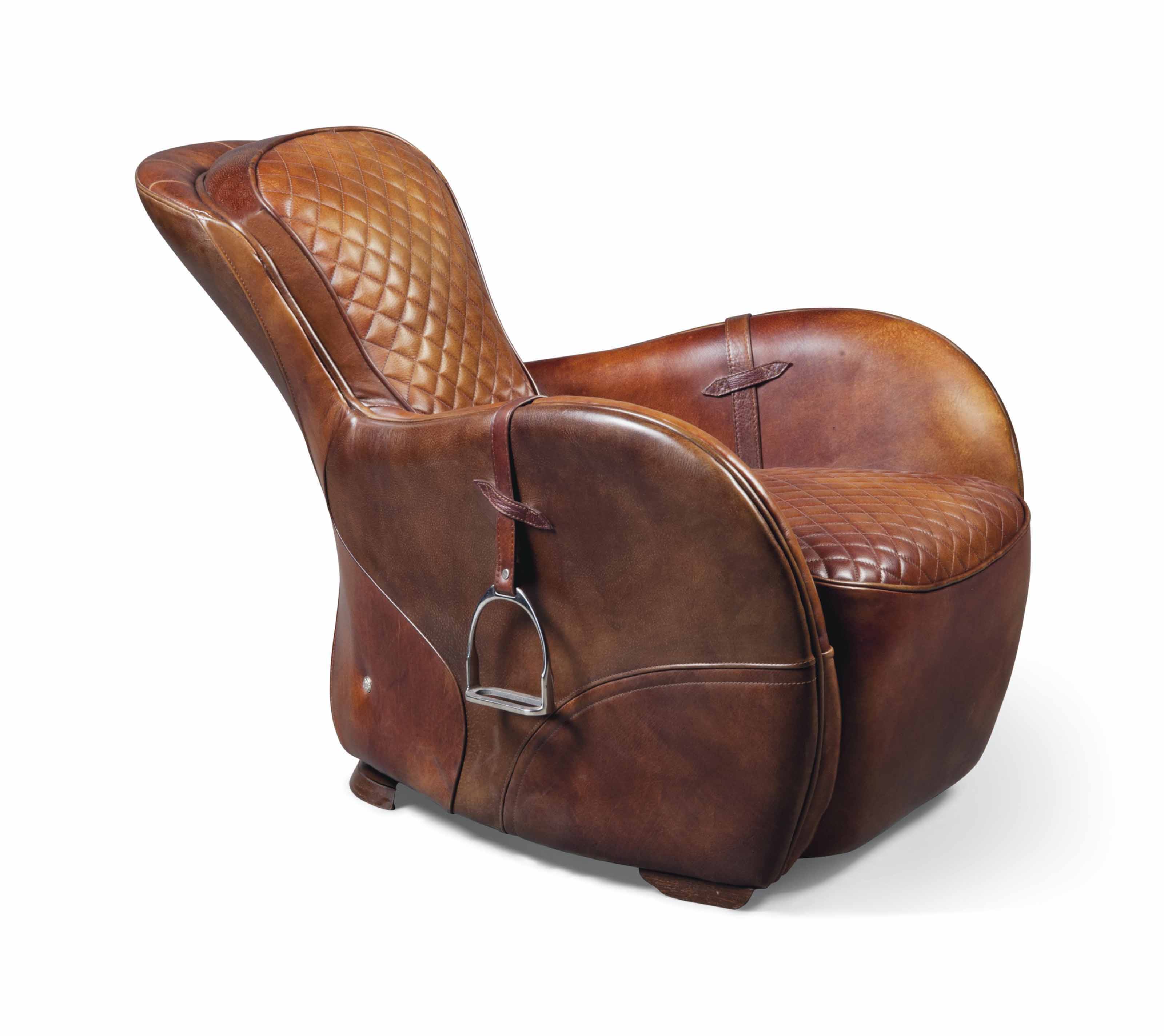 A ' SADDLE ' EASY ARMCHAIR