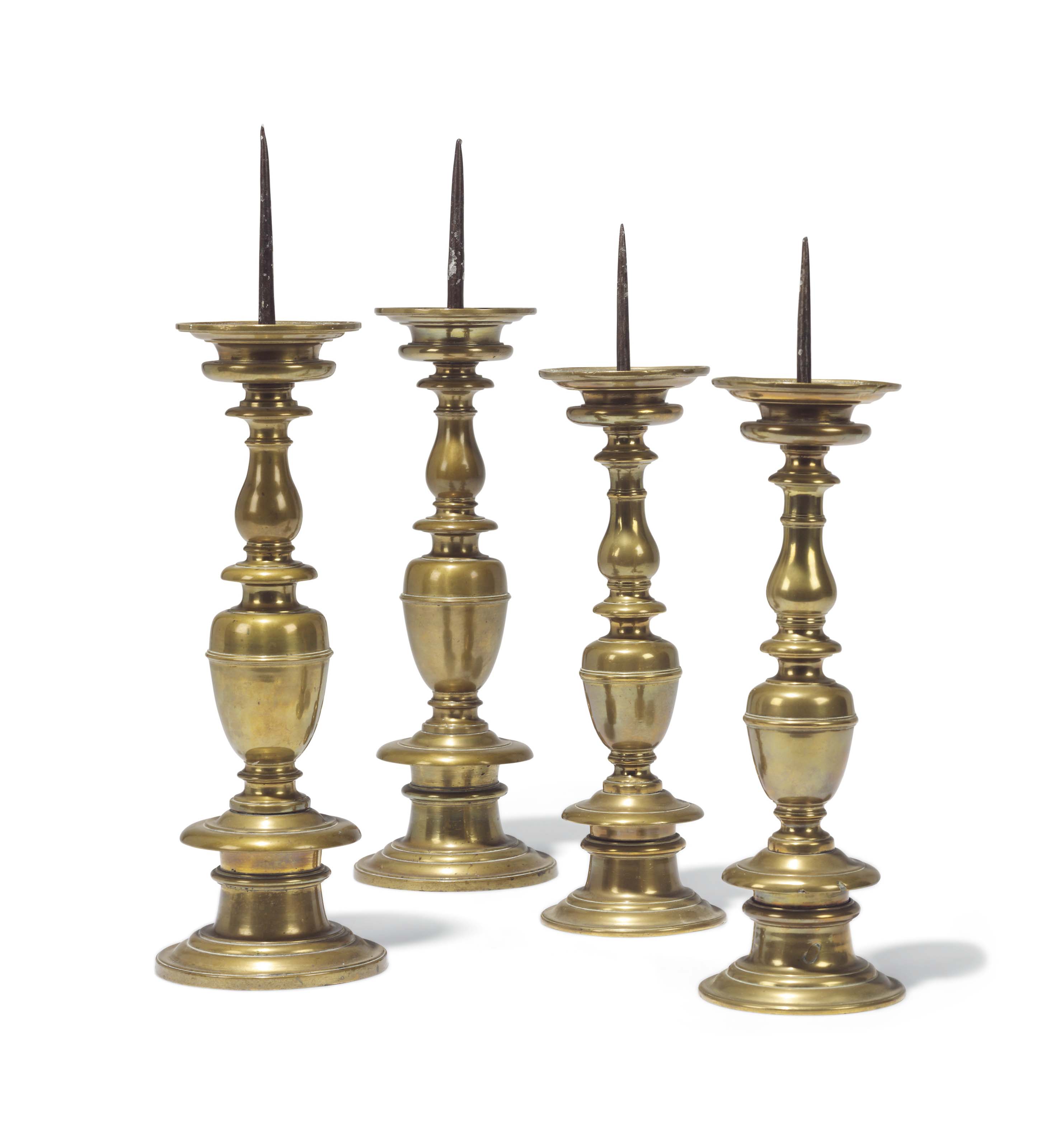 TWO PAIRS OF ITALOFLEMISH BRASS PRICKET CANDLESTICKS , 18TH CENTURY