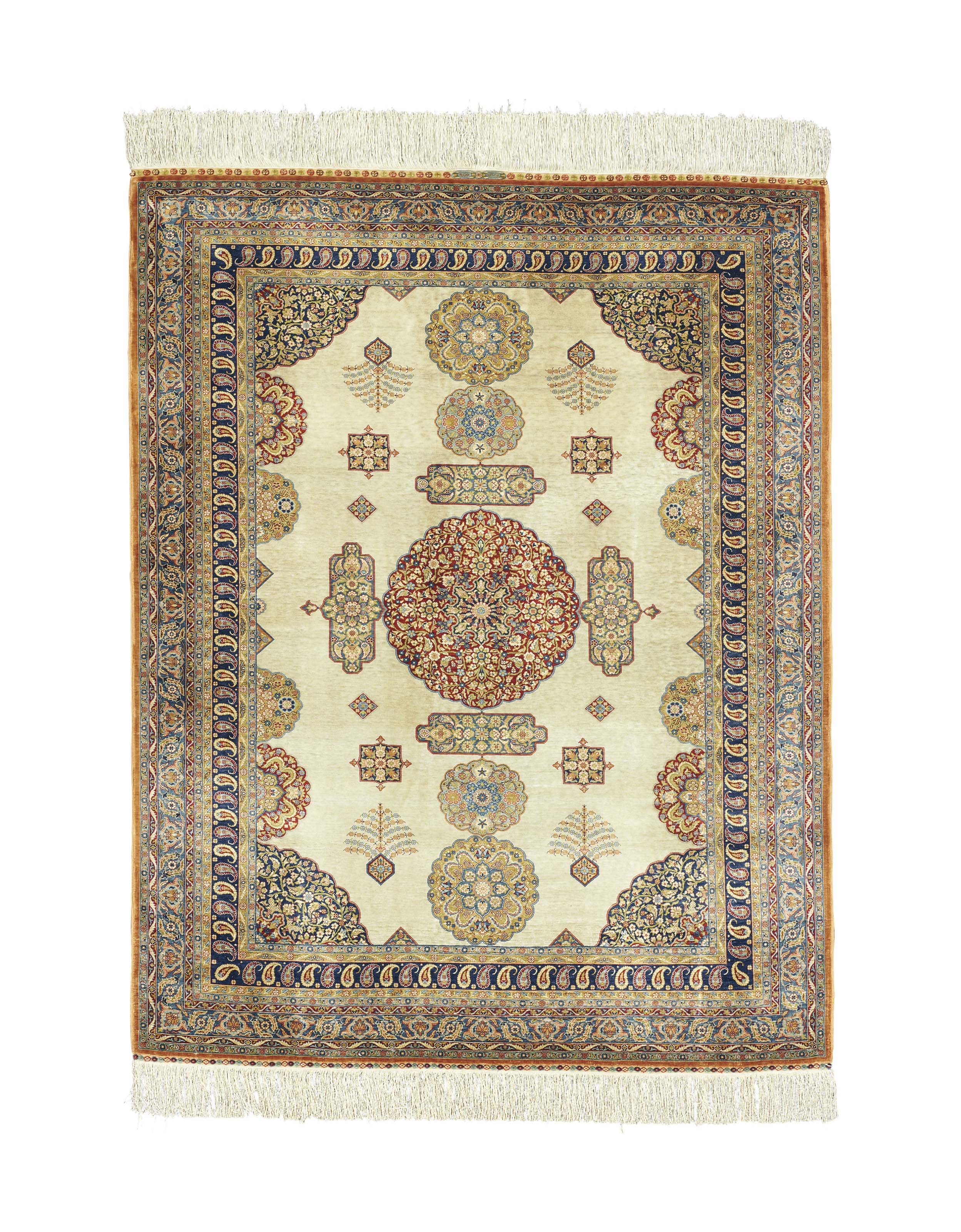 AN EXTREMELY FINE SILK HEREKE RUG