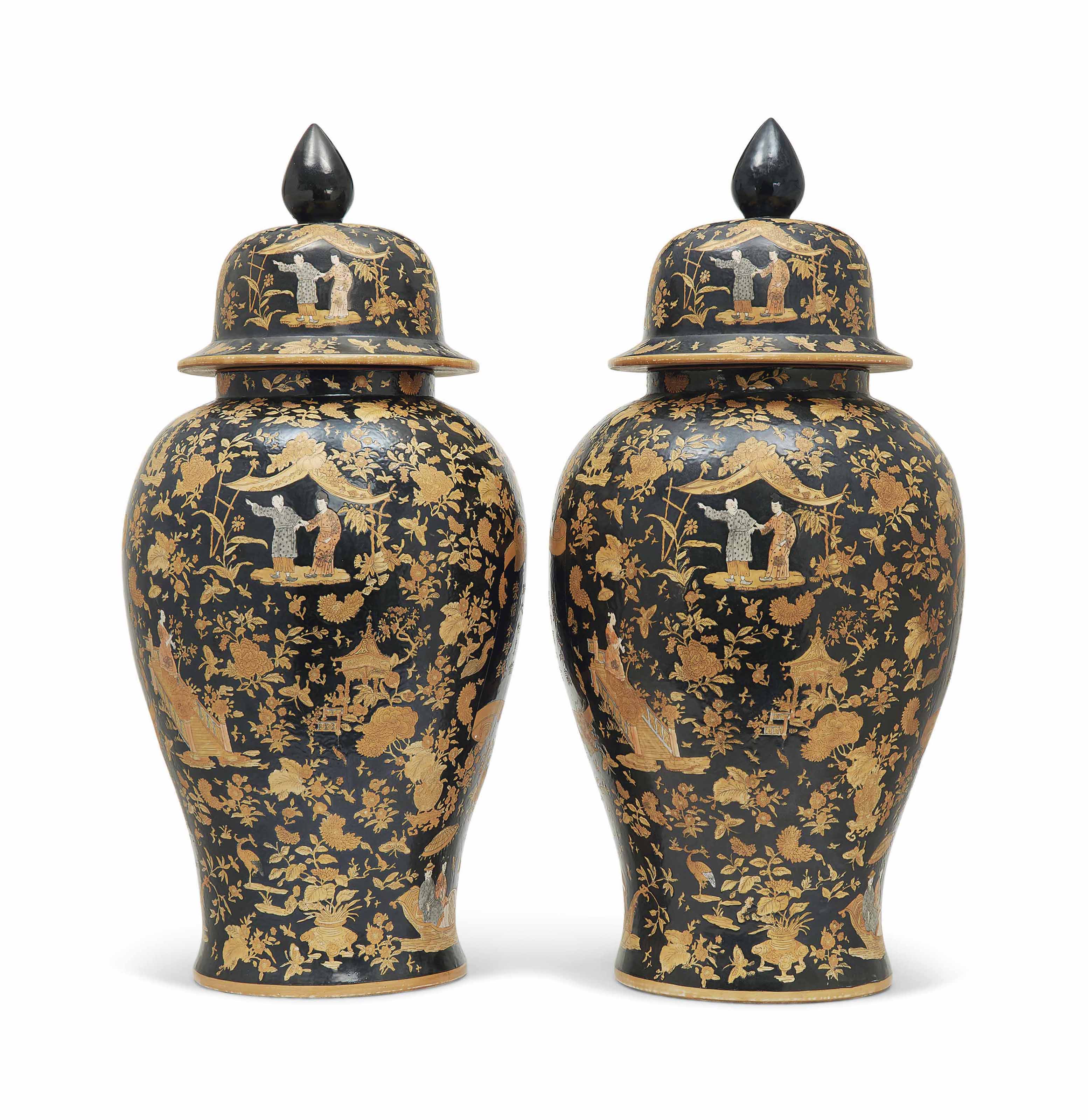 A PAIR OF BLACK CHINOISERIE DECORATED CERAMIC VASES AND COVERS , LATE 20TH CENTURY Christie's