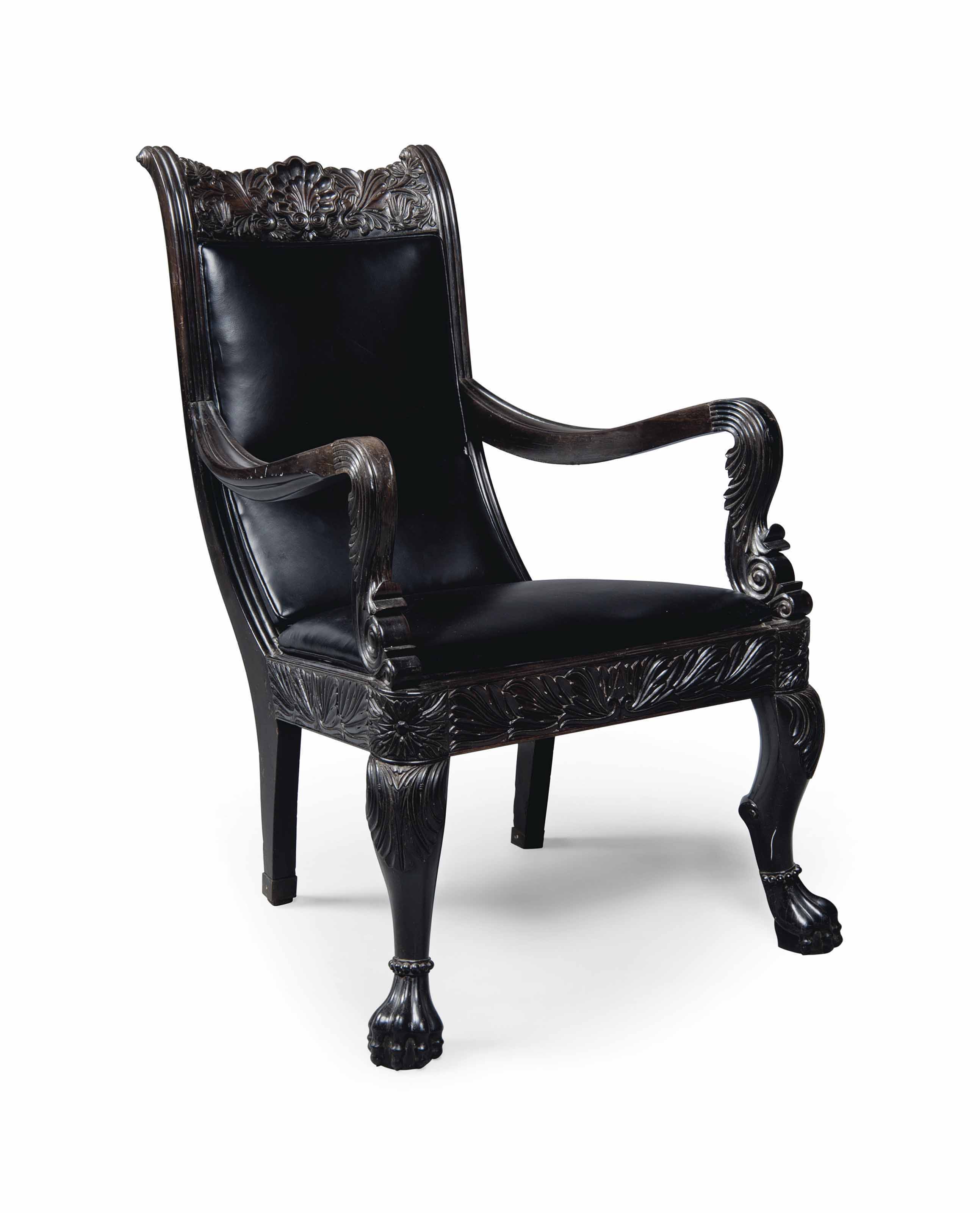 AN ANGLOINDIAN EBONY ARMCHAIR , SECOND QUARTER 19TH CENTURY, PROBABLY