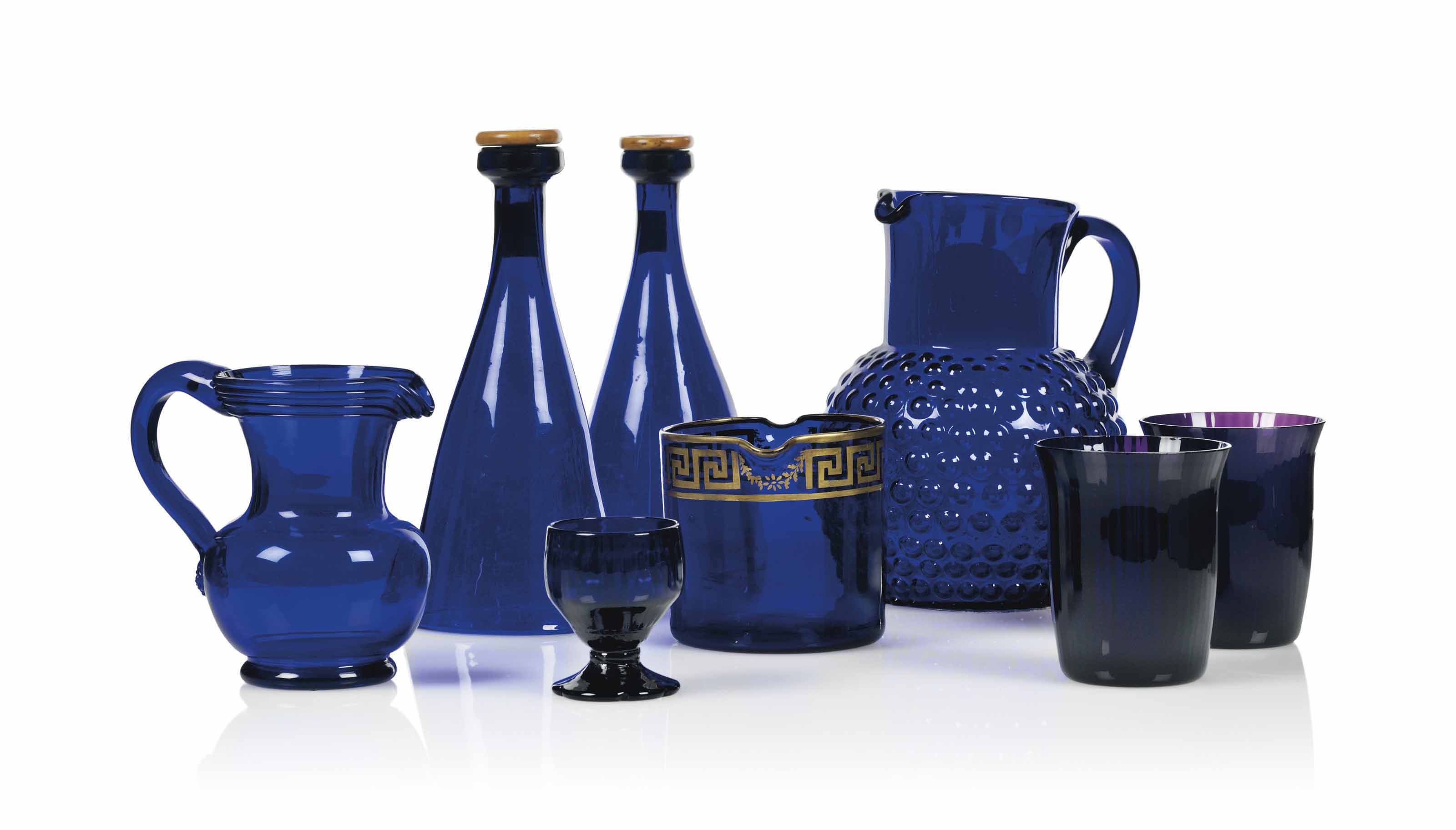 A GROUP OF DARKBLUE GLASS , THE WINECOOLER CIRCA 1800, THE OTHERS