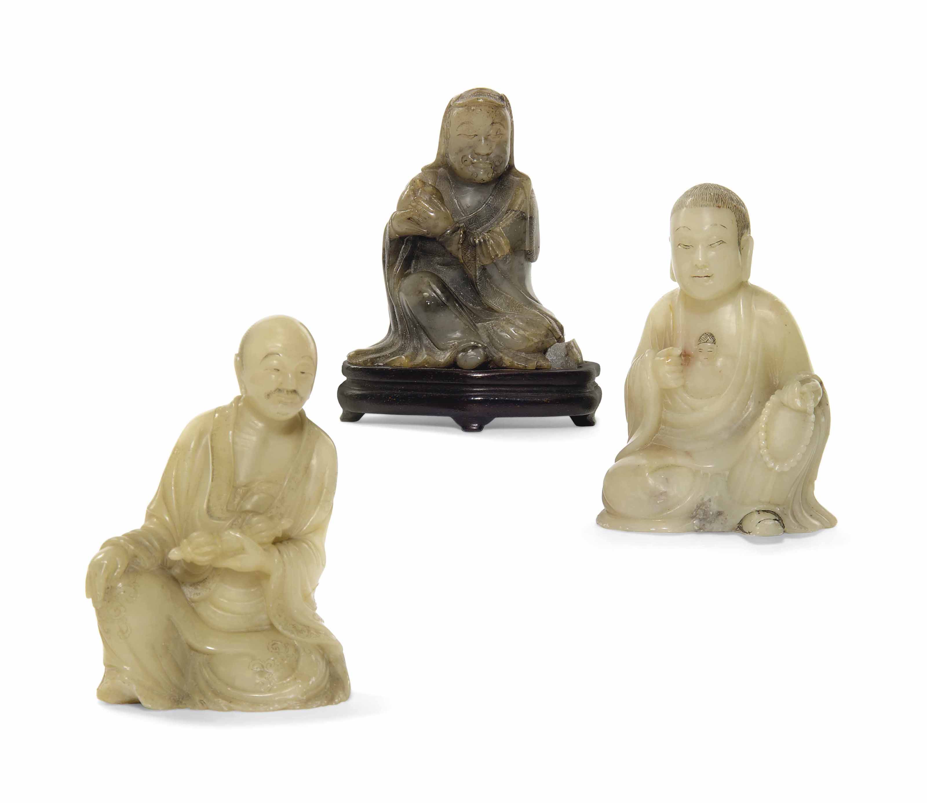 A GROUP OF THREE CHINESE SOAPSTONE FIGURES OF LUOHAN , 18TH AND 19TH