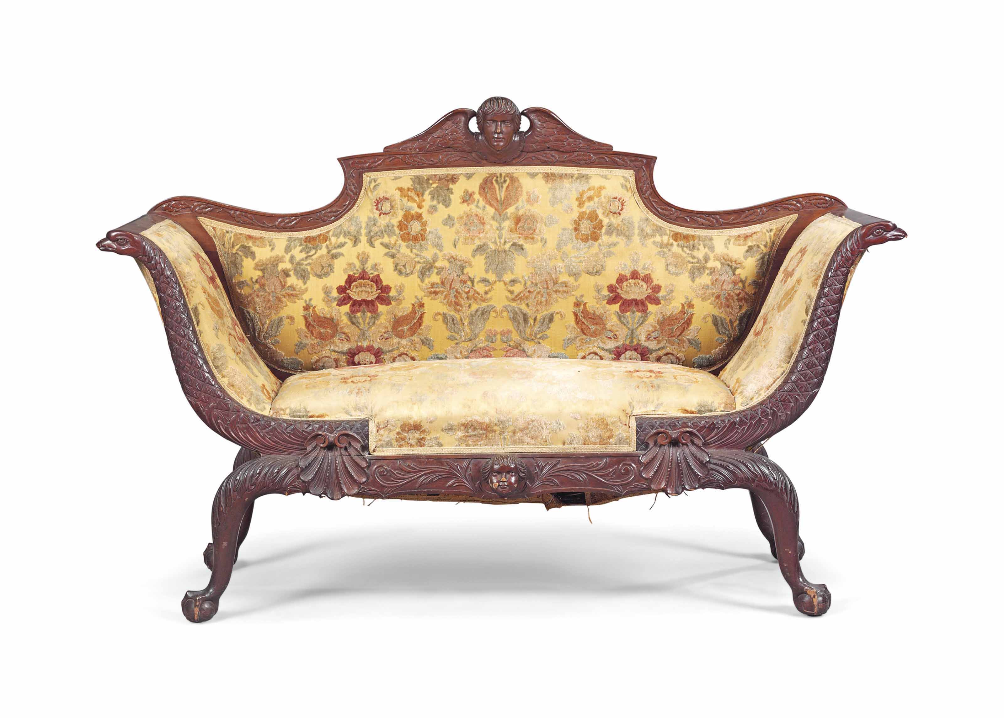 A LATE VICTORIAN MAHOGANY SOFA , IRISH, ATTRIBUTED TO M. BUTLER OF