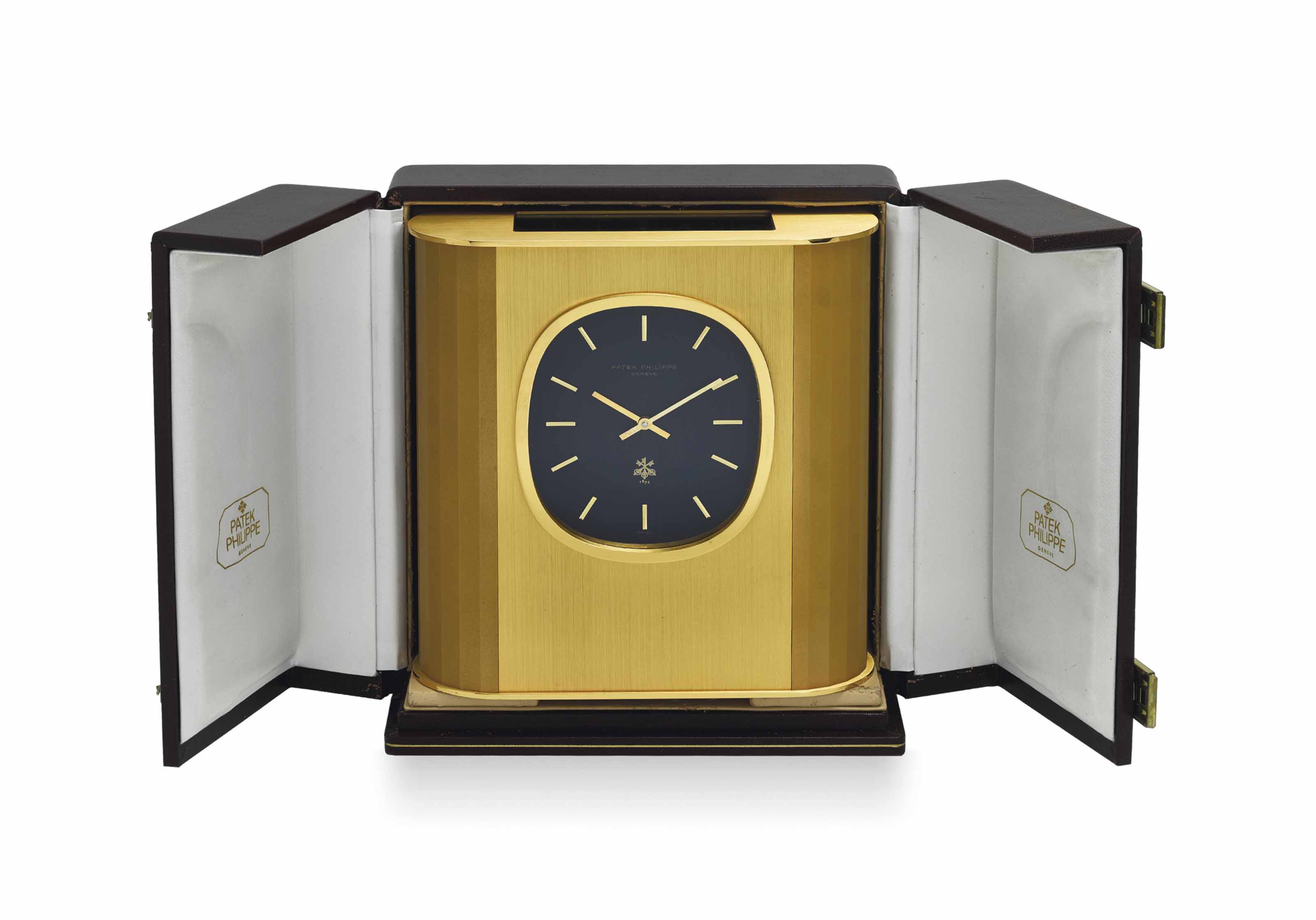 Patek Philippe A Gilt Brass Rectangular Solar Powered Desk Clock Clocks frozen clock desk clock bedside alarm electronic watch square kids decor. gilt brass rectangular solar powered