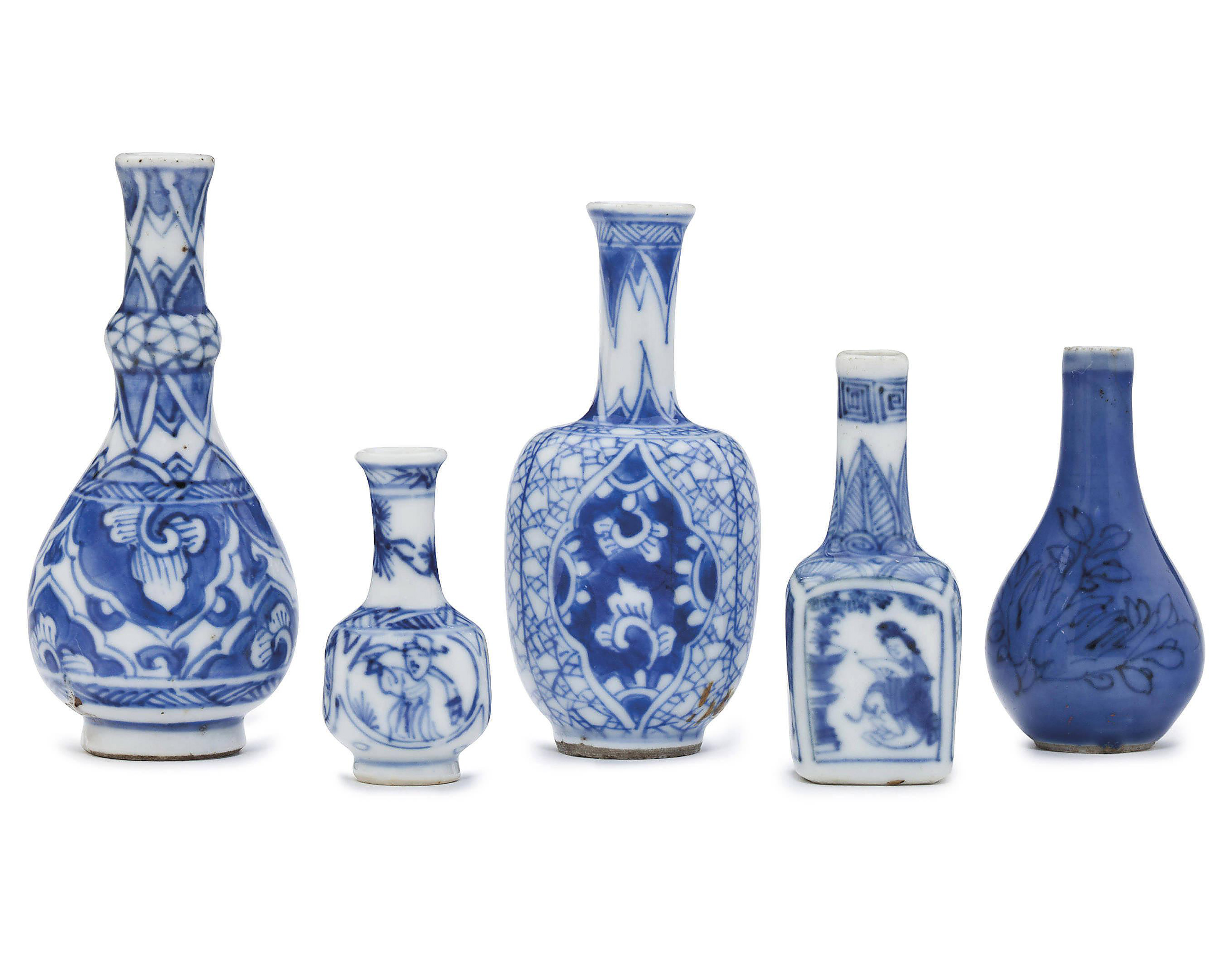 FOUR MINIATURE BLUE AND WHITE VASES AND A MINIATURE BLUEGLAZED VASE