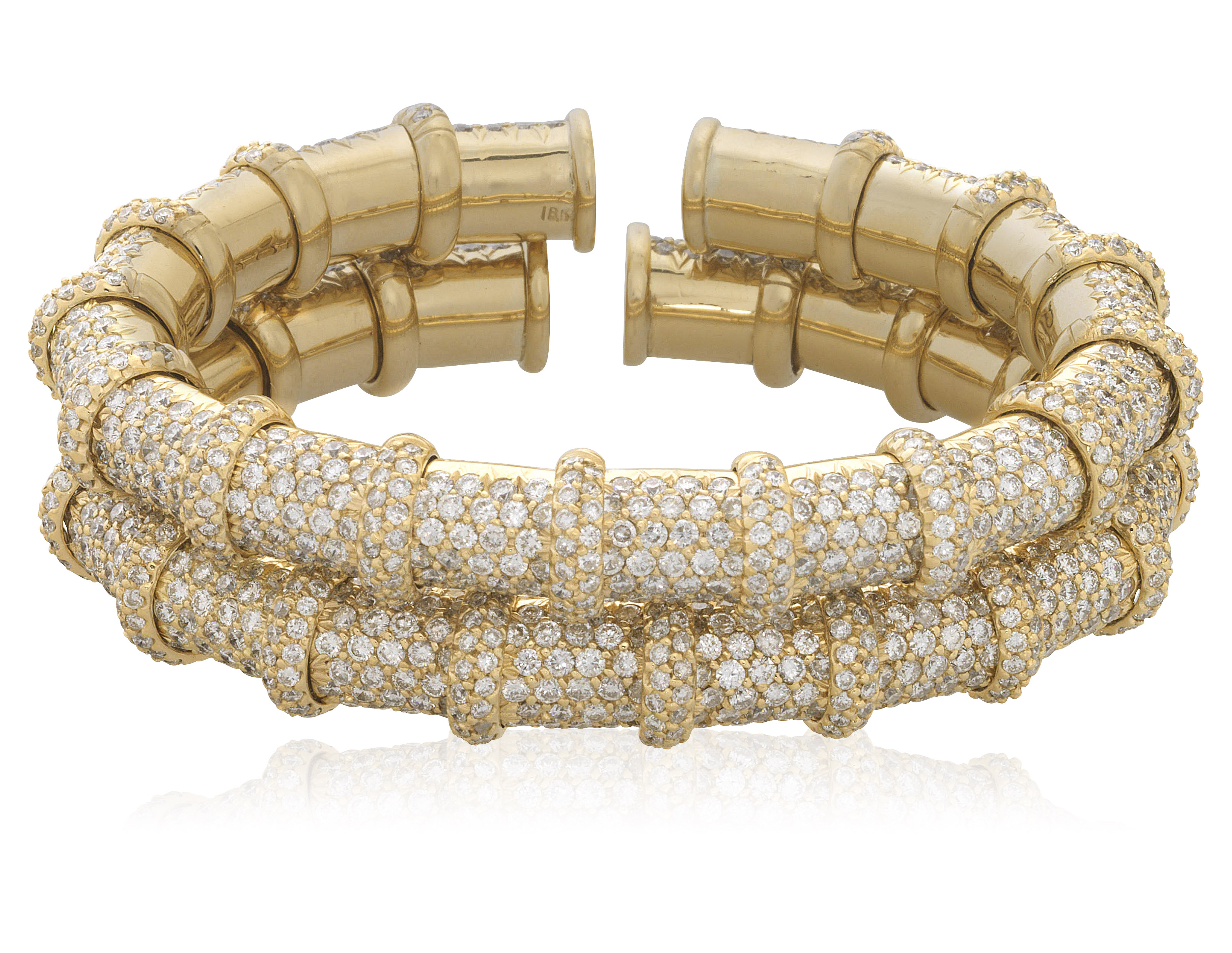 PAIR OF DIAMOND AND GOLD CUFF BRACELETS, Christie’s