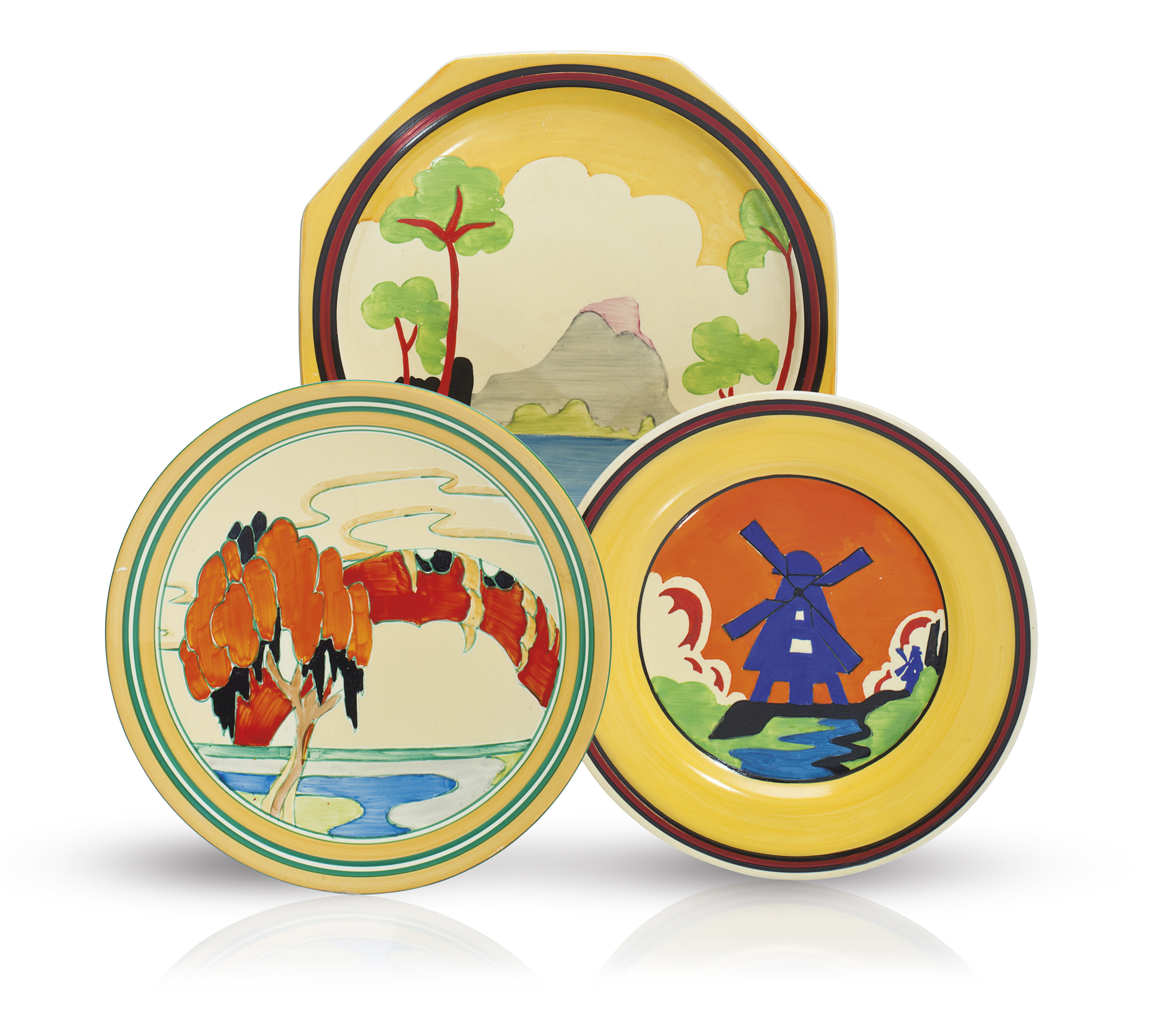 Three Clarice Cliff Plates Second Quarter 20th Century Various Black Printed Script And Hand Painted Marks Christie S