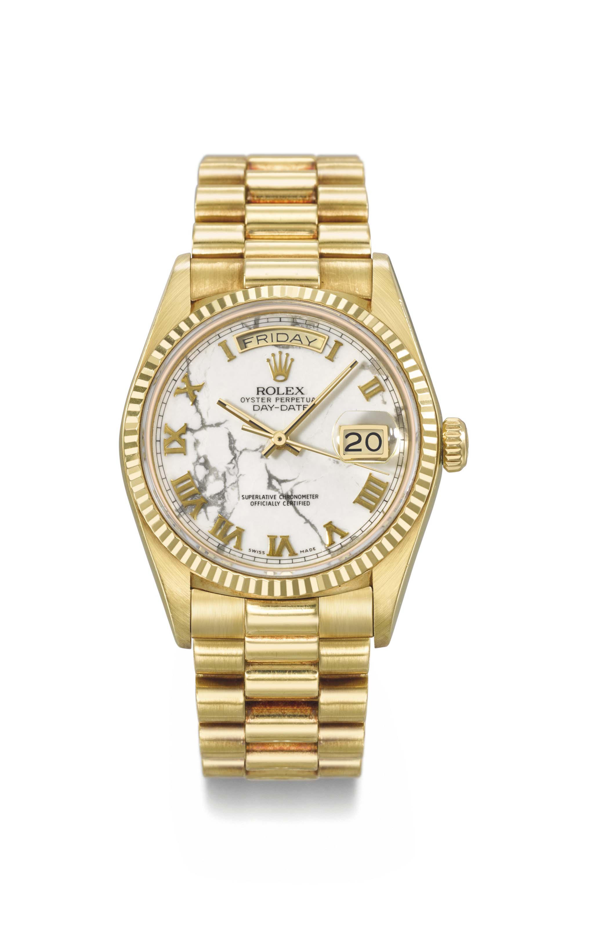 Rolex. A fine and rare 18K gold automatic wristwatch with day, date ...