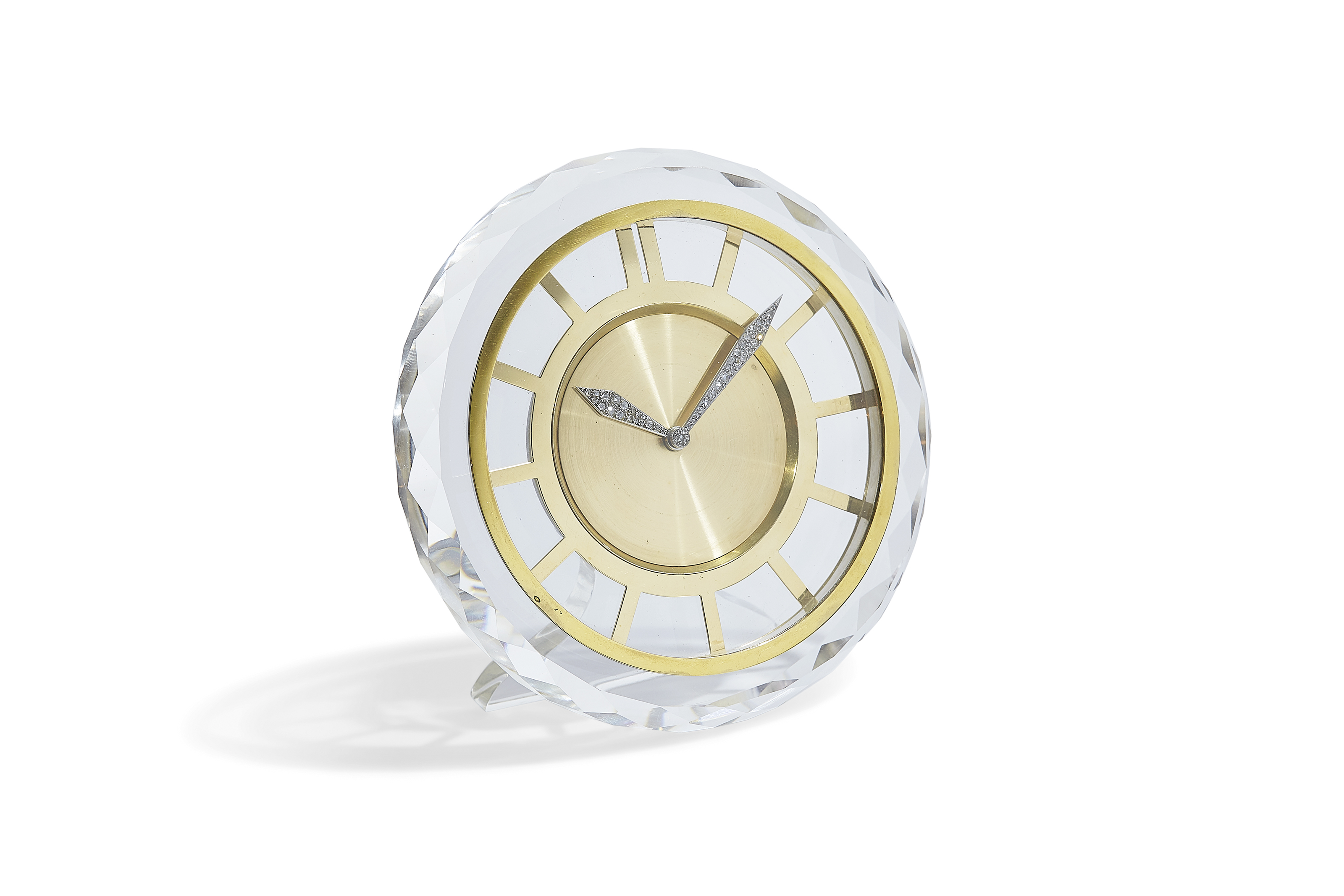 A ROCK CRYSTAL AND DIAMOND DESK CLOCK, BY CARTIER Christie's