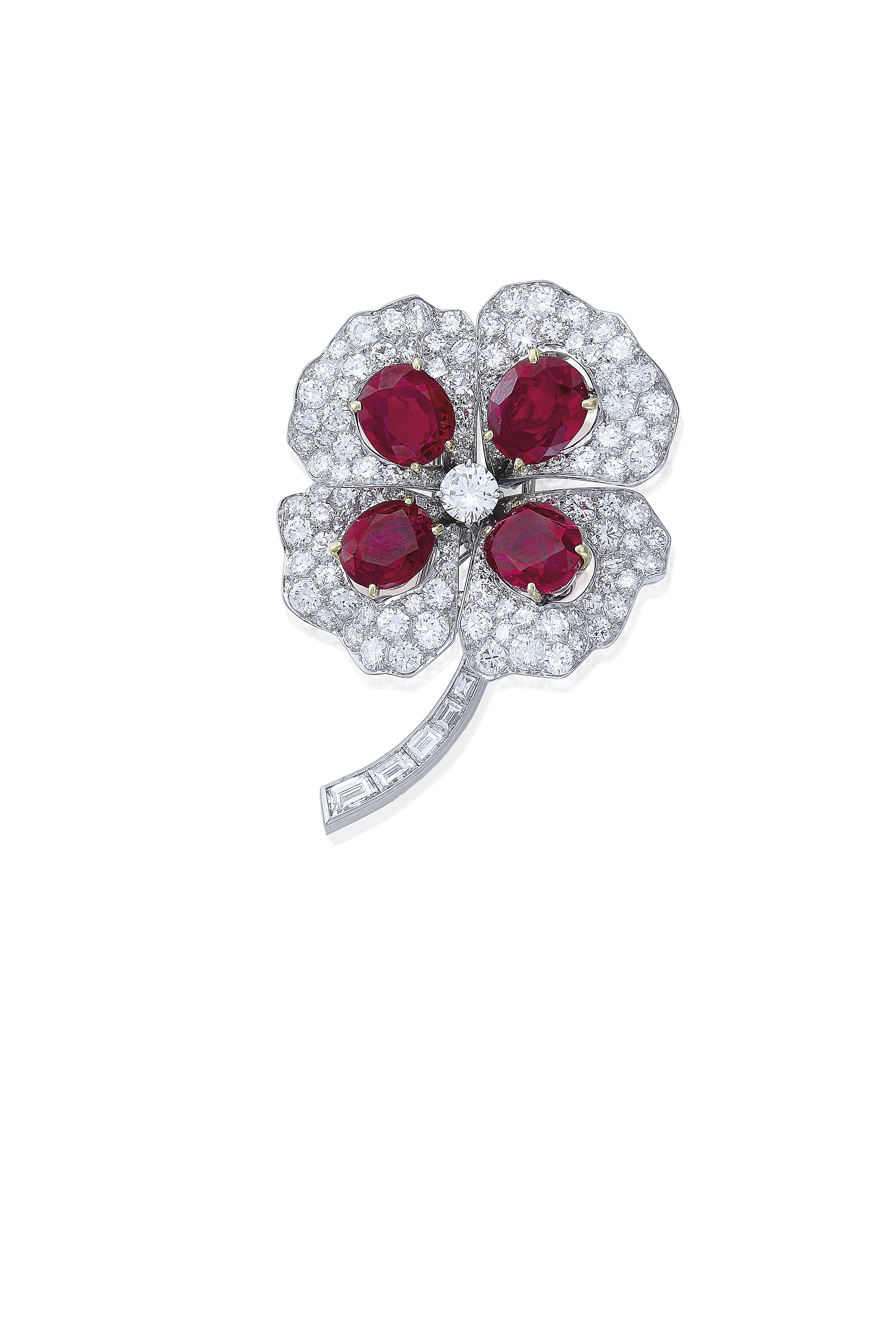 A RUBY AND DIAMOND 'TRÈFLE À QUATRE FEUILLES' BROOCH, BY BOUCHER