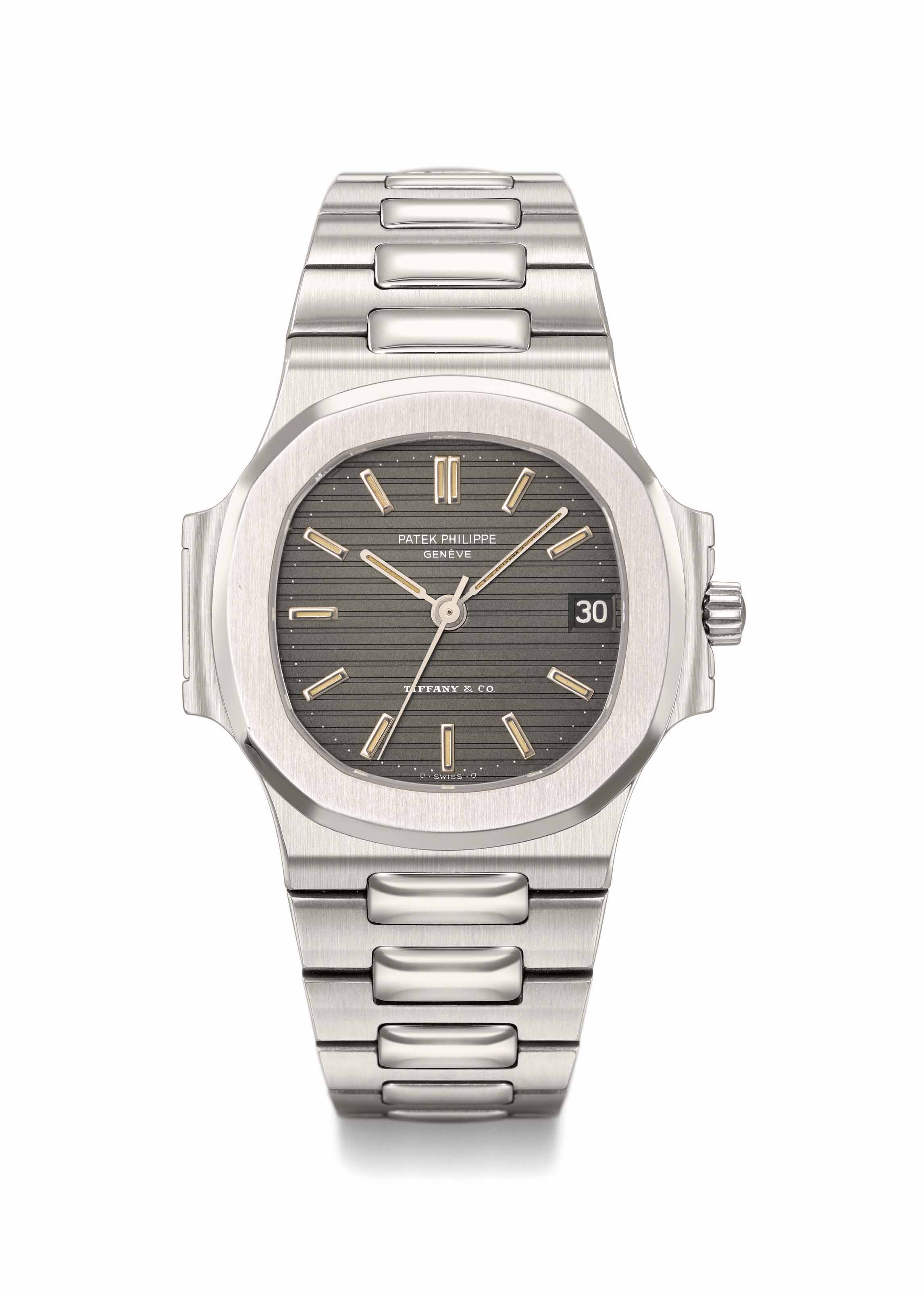 Patek Philippe A Fine And Rare Stainless Steel Automatic Wristwatch With Sweep Centre Seconds Date Bracelet And Box Signed Patek Philippe Geneve Retailed By Tiffany Co Nautilus Model Ref 3800 1
