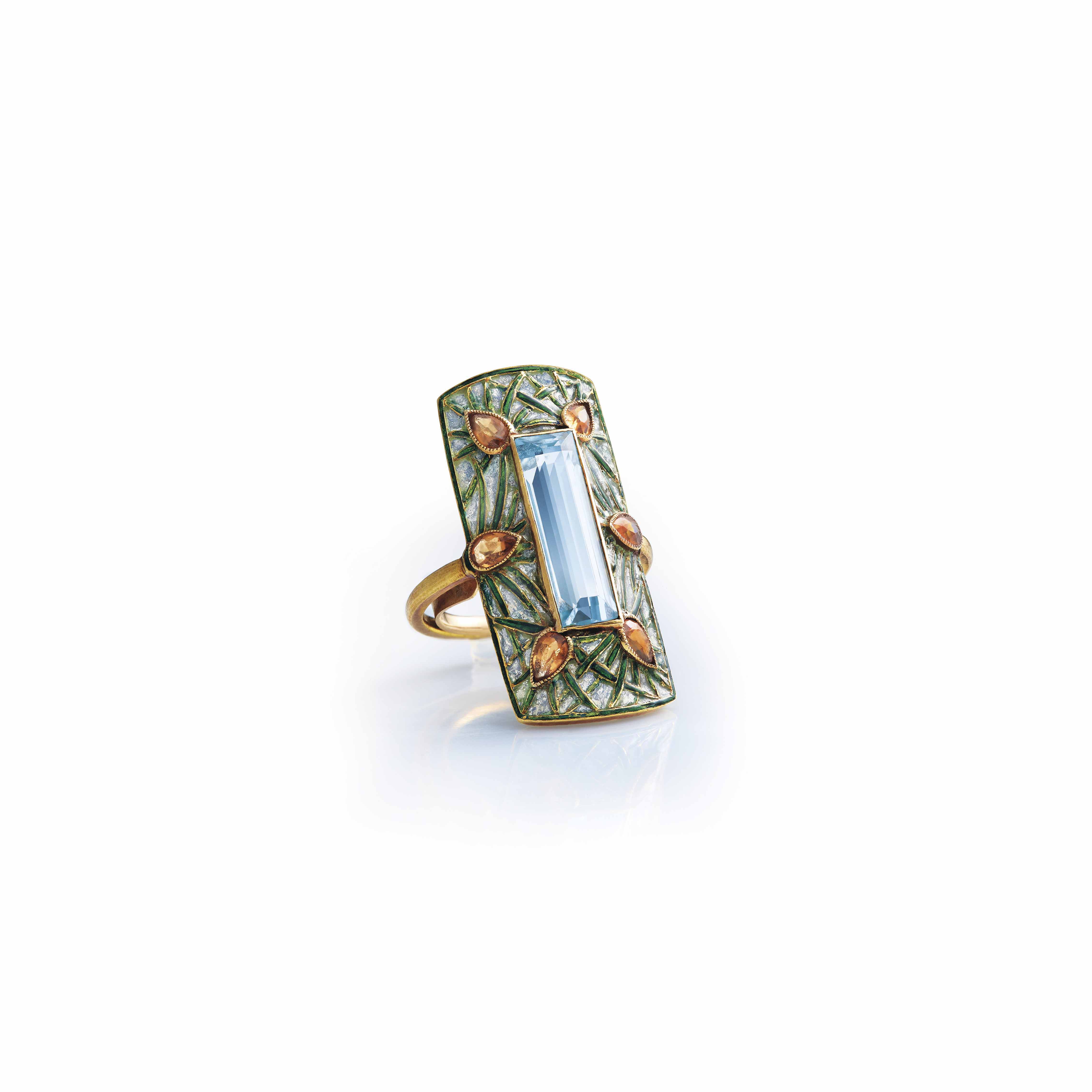 AN ART NOUVEAU AQUAMARINE, GARNET AND ENAMEL RING, BY ...