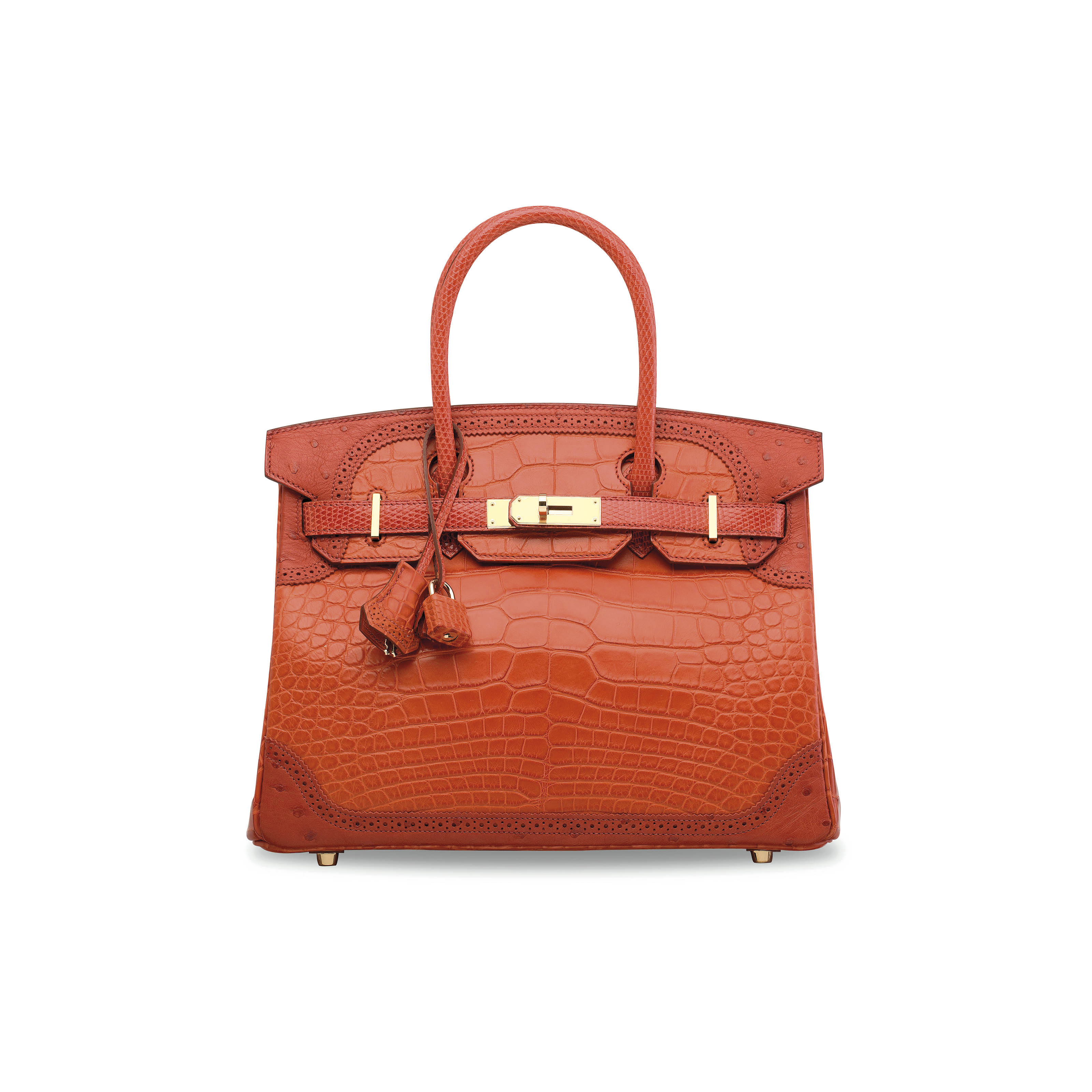 AN ORANGE TOGO LEATHER TRAVEL BIRKIN 50 WITH GOLD HARDWARE
