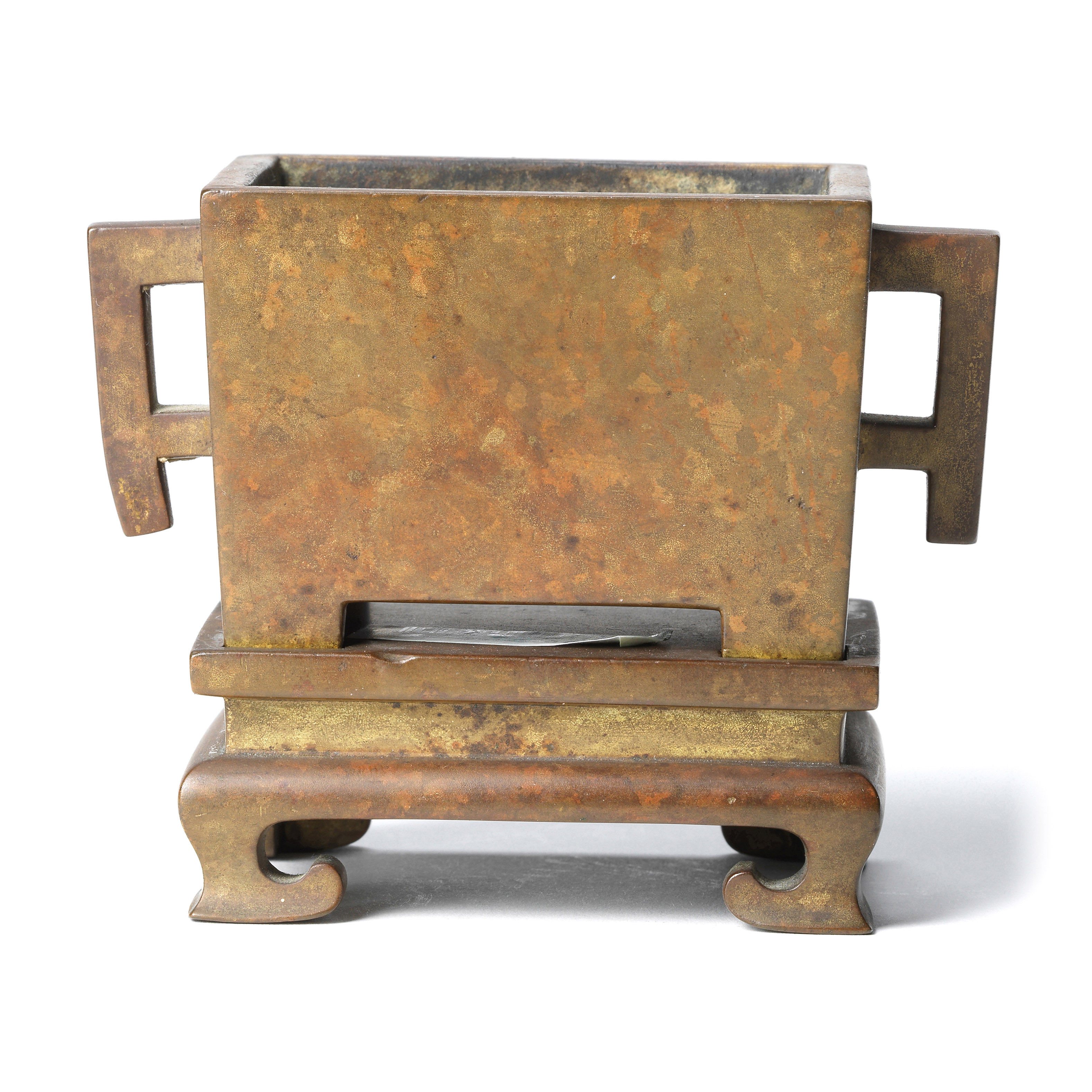 An archaistic copper-inlaid bronze tripod censer (Ding