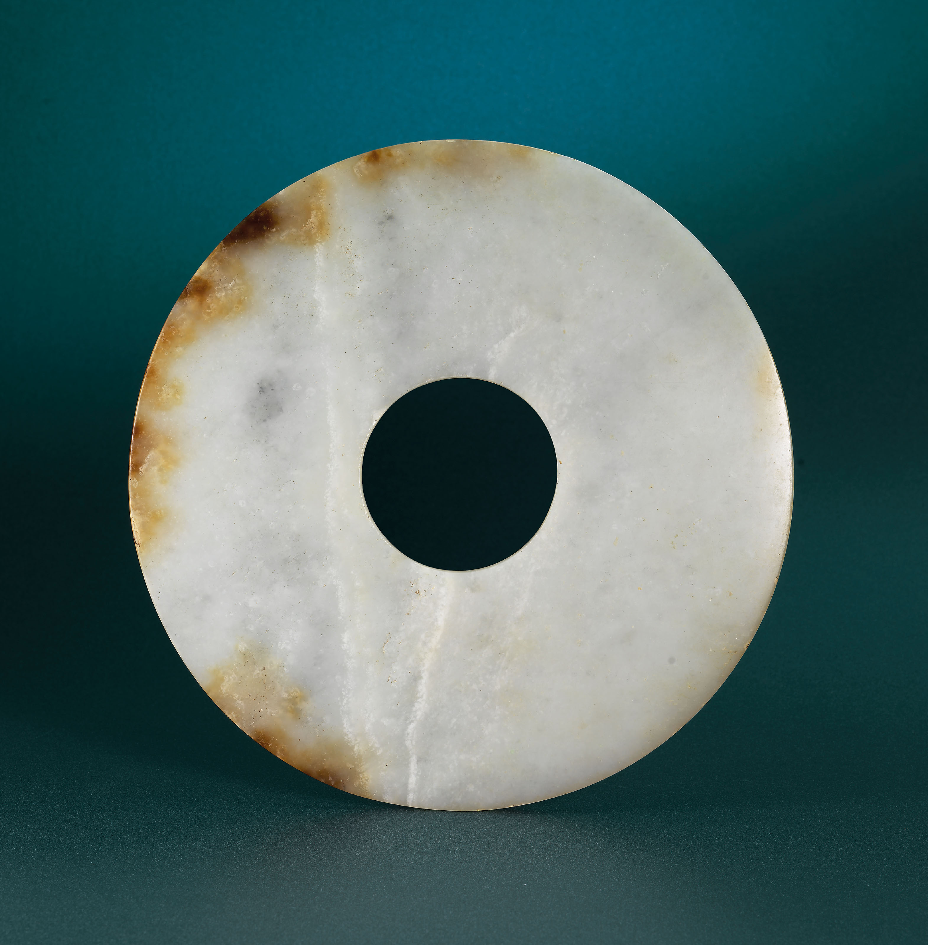 A RARE JADE 'PHOENIX' ORNAMENT, WARRING STATES PERIOD (475-221 BC