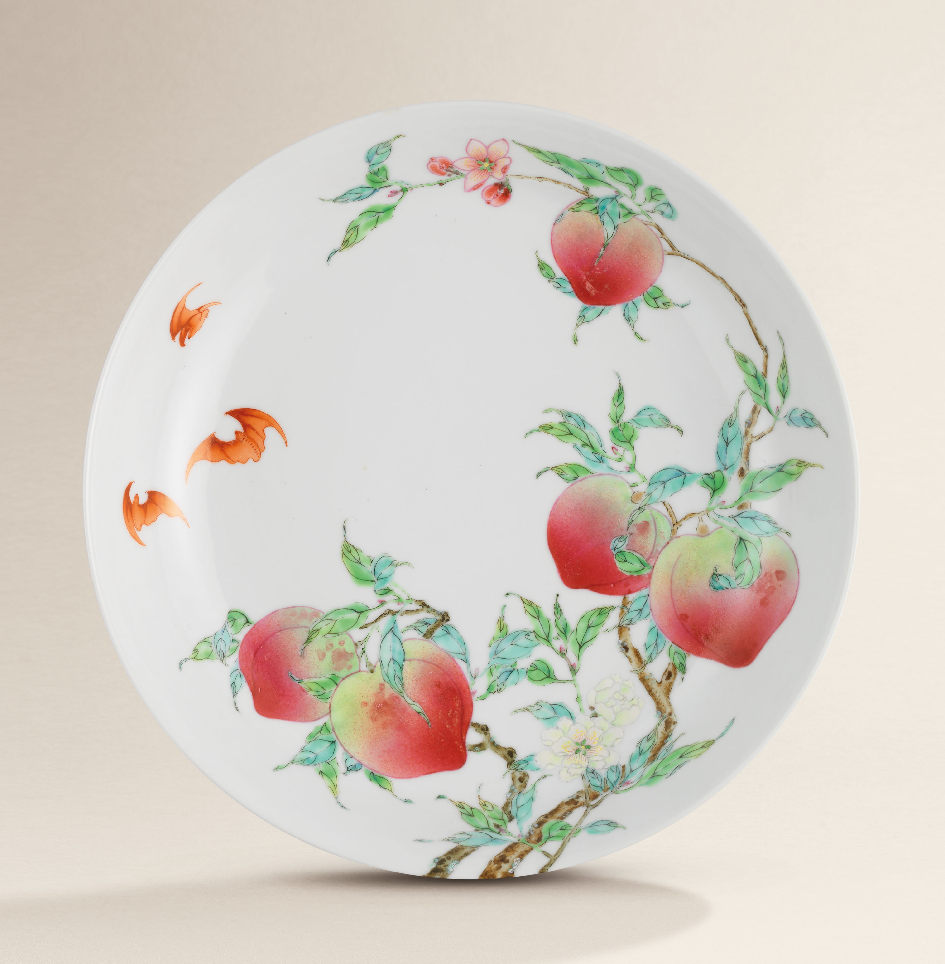 A FINE AND EXCEPTIONAL FAMILLE ROSE ‘PEACH’ DISH , YONGZHENG SIX