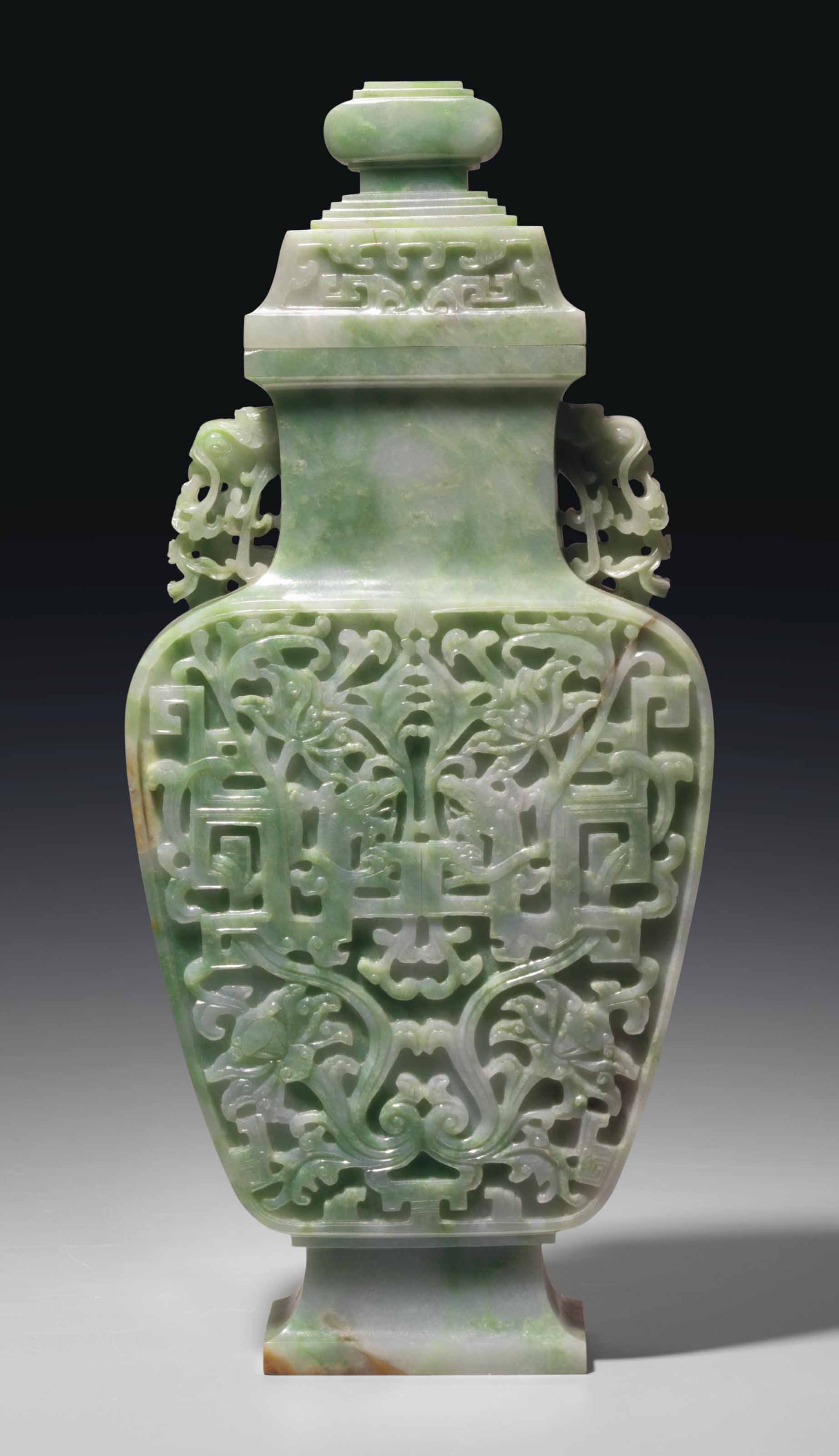 A LARGE ARCHAISTIC MOTTLEDGREEN JADEITE VASE AND COVER Christie's