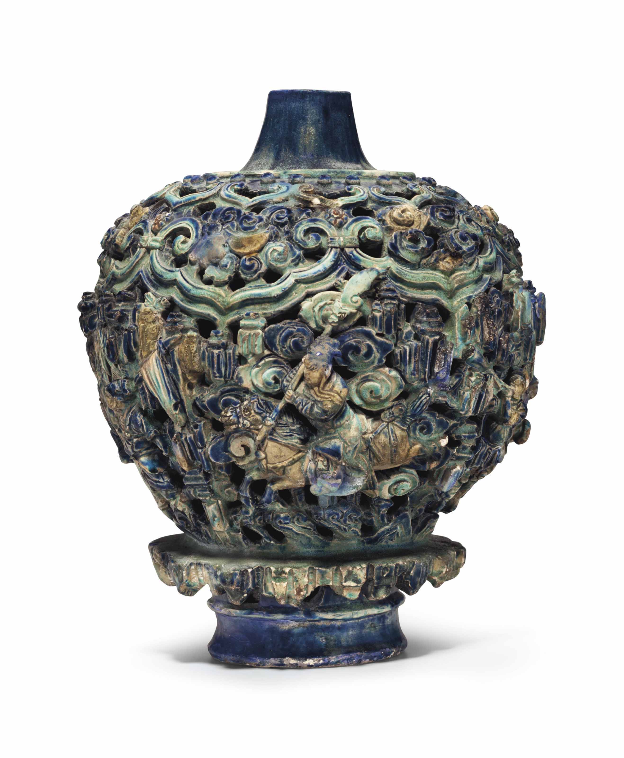 A RARE HEAVILYPOTTED RETICULATED FAHUA JAR , MING DYNASTY (13681644