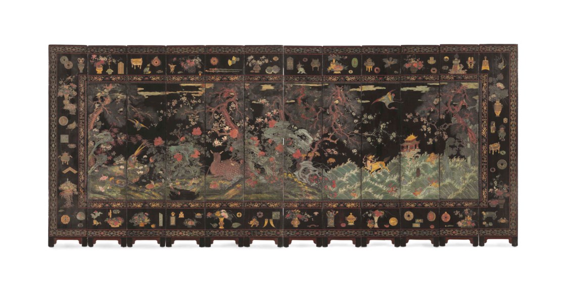 A MAGNIFICENT TWELVEPANEL COROMANDEL LACQUER SCREEN, KANGXI PERIOD