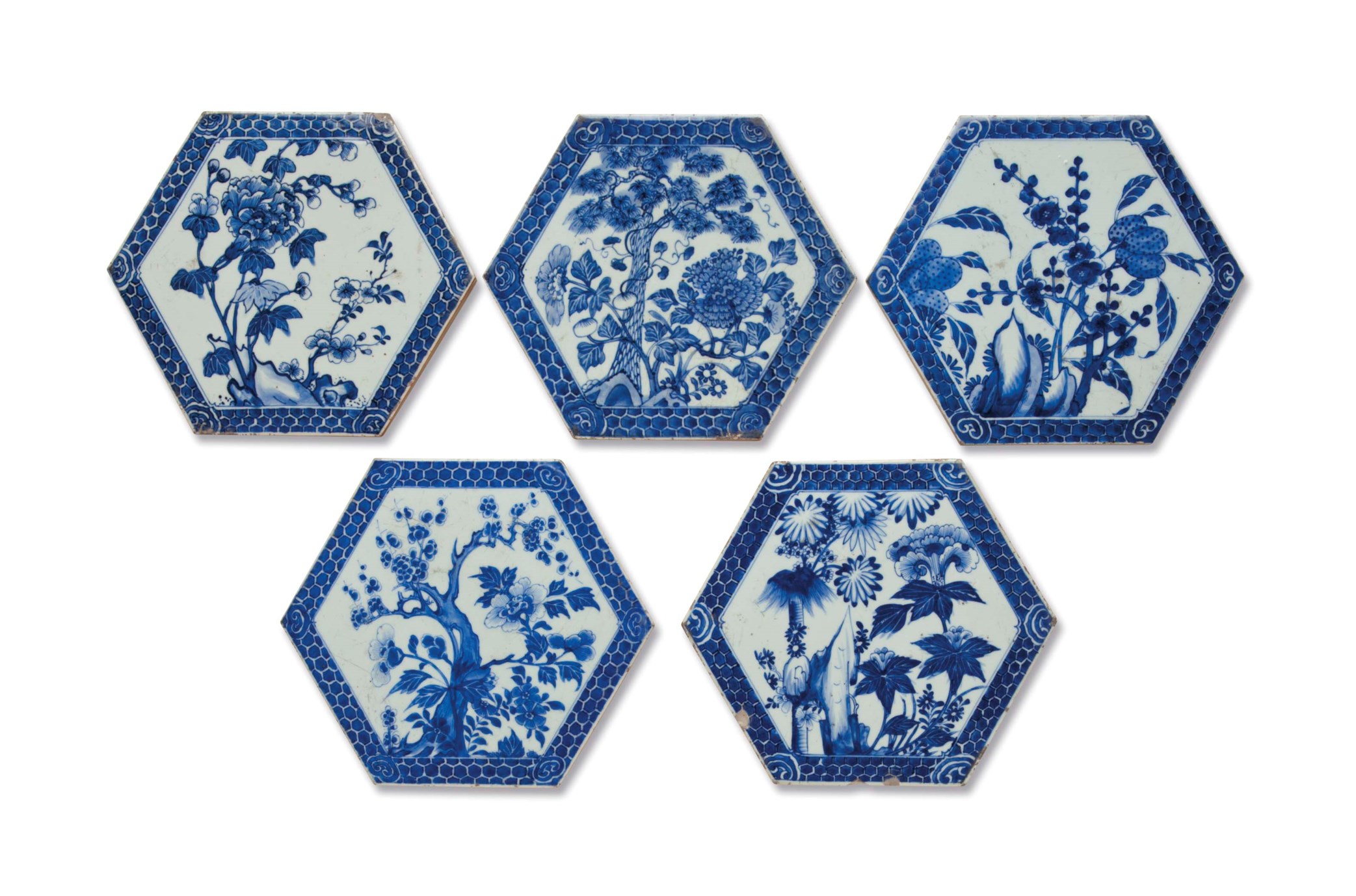 A SET OF FIVE BLUE AND WHITE TILES