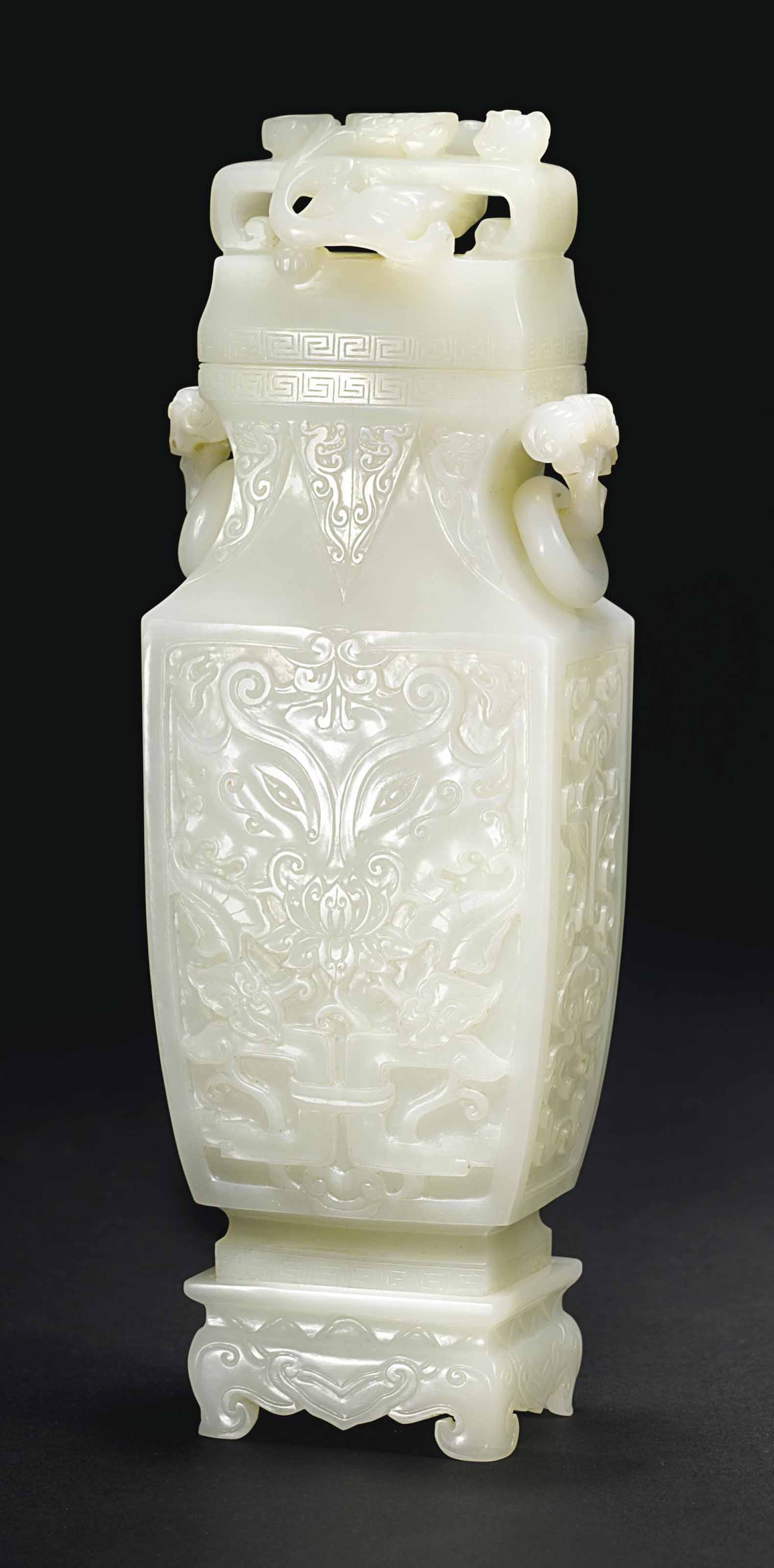A WHITE JADE ARCHAISTIC VASE, COVER AND STAND Christie's