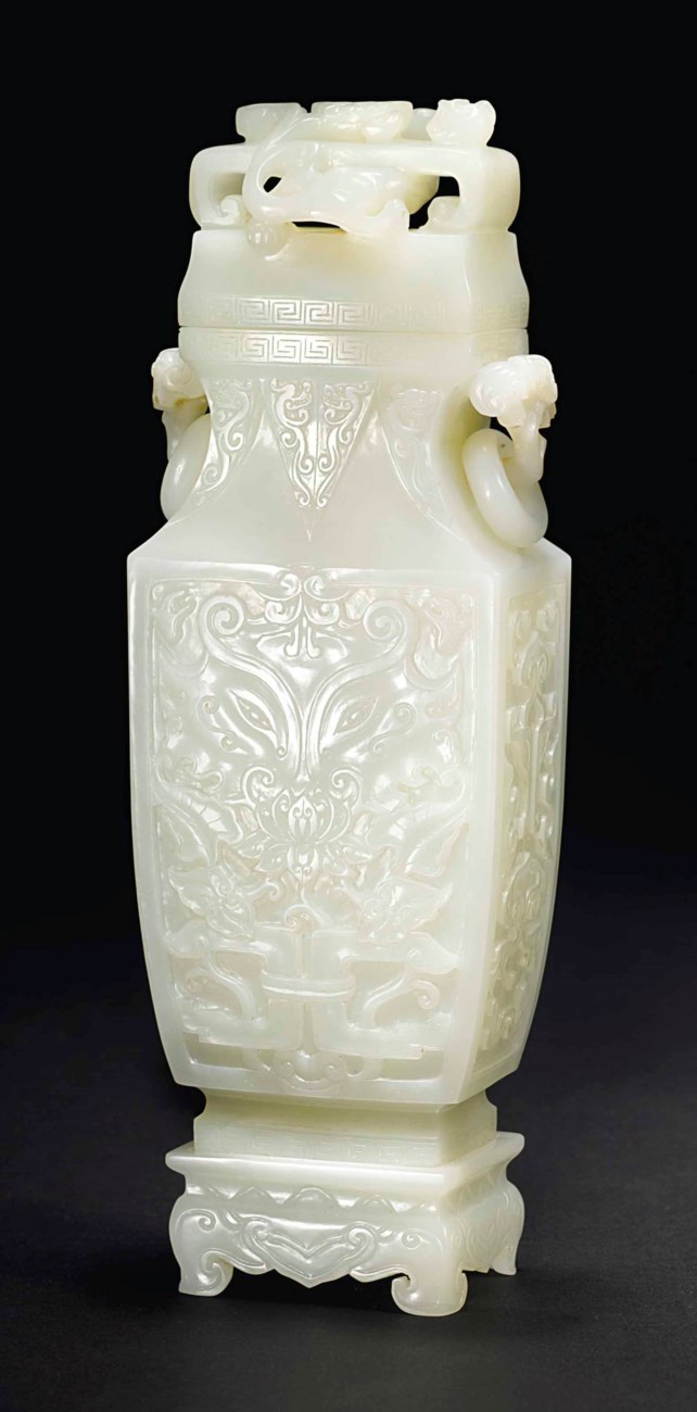 A WHITE JADE ARCHAISTIC VASE, COVER AND STAND