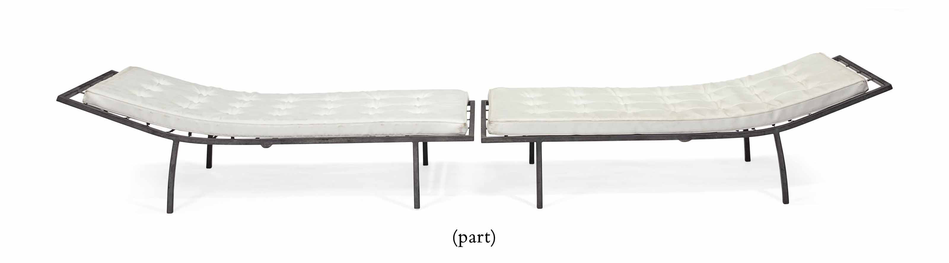 A PAIR OF BLACKPAINTED METAL CHAISE LONGUES , BY WILLIAM HAINES, CIRCA