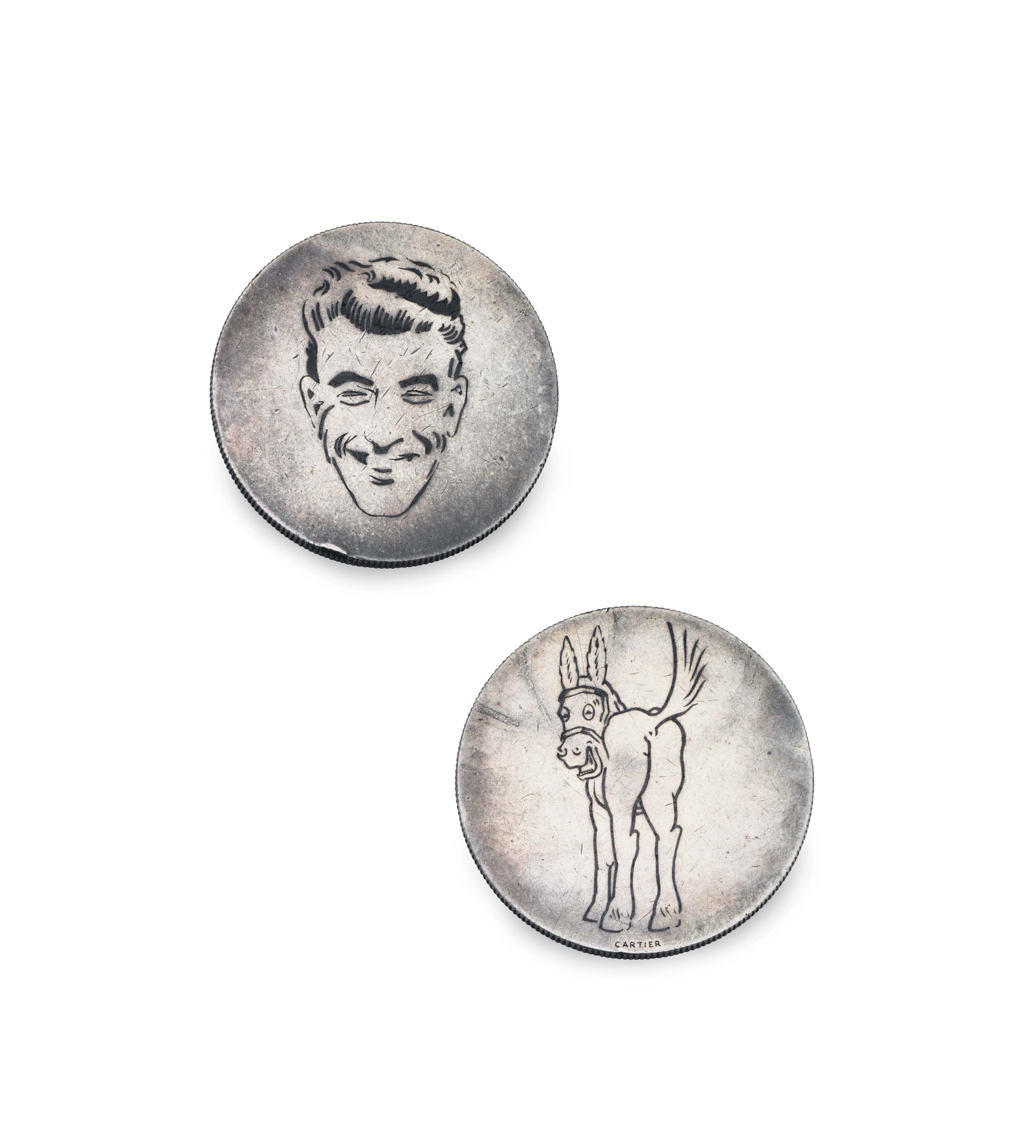 A SILVER HEADS OR TAILS COIN, BY CARTIER